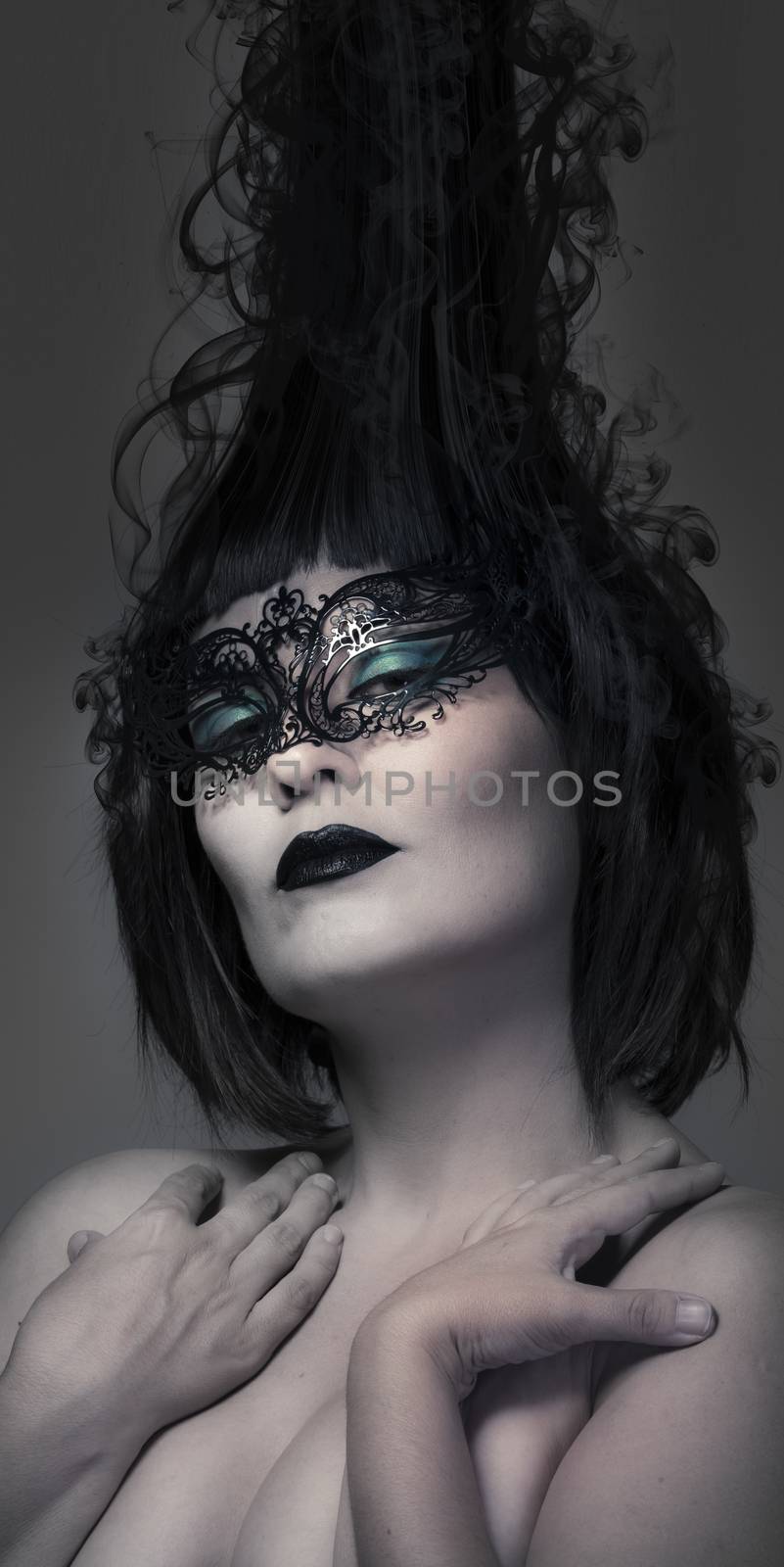 Mask, beauty concept, beautiful brunette woman with smooth skin by FernandoCortes