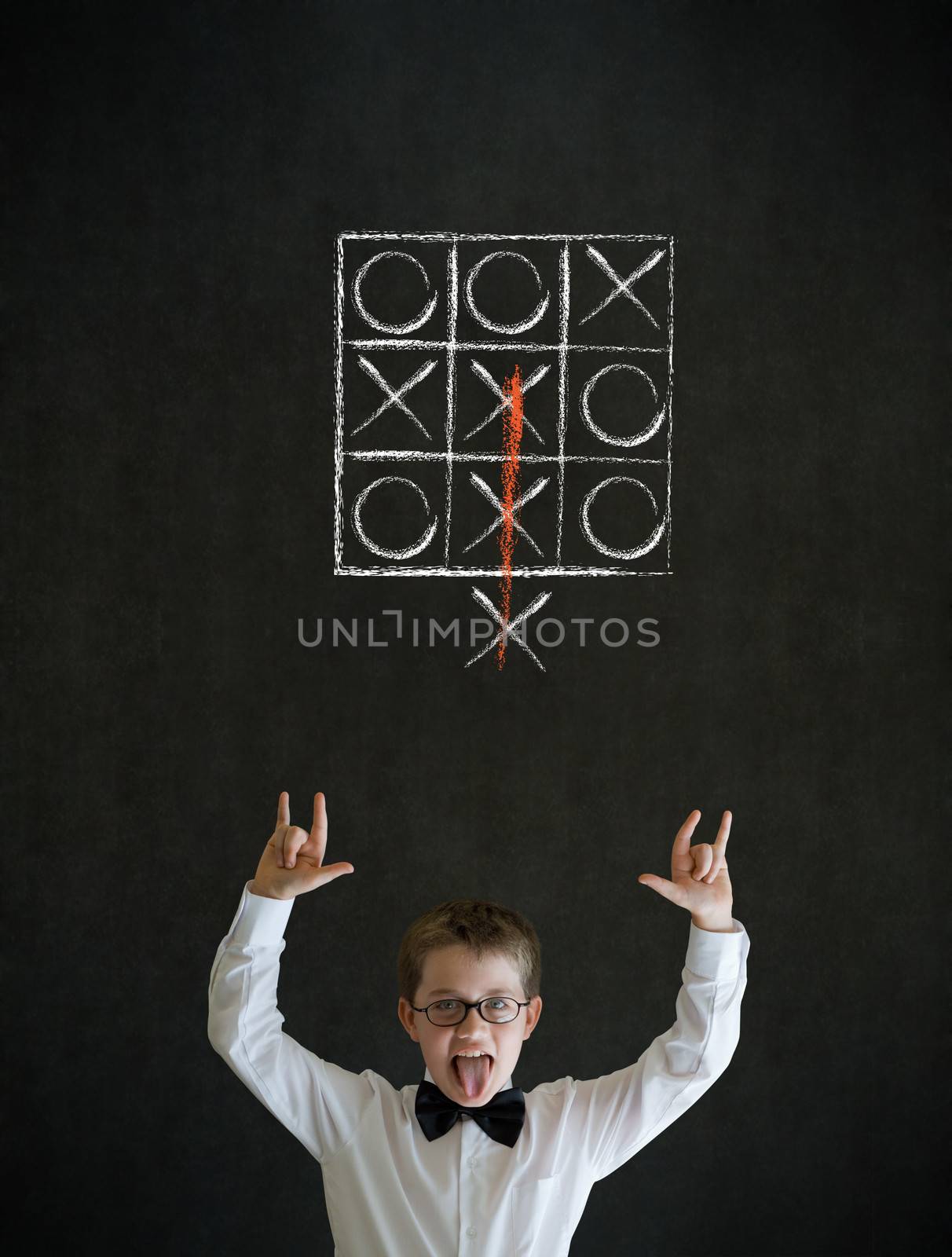 Knowledge rocks boy business man with thinking out of the box tic tac toe concept by alistaircotton