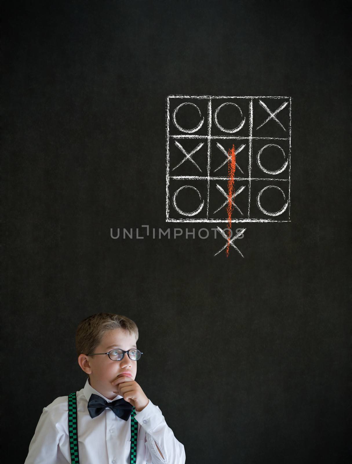 Thinking boy business man with thinking out of the box tic tac toe concept by alistaircotton
