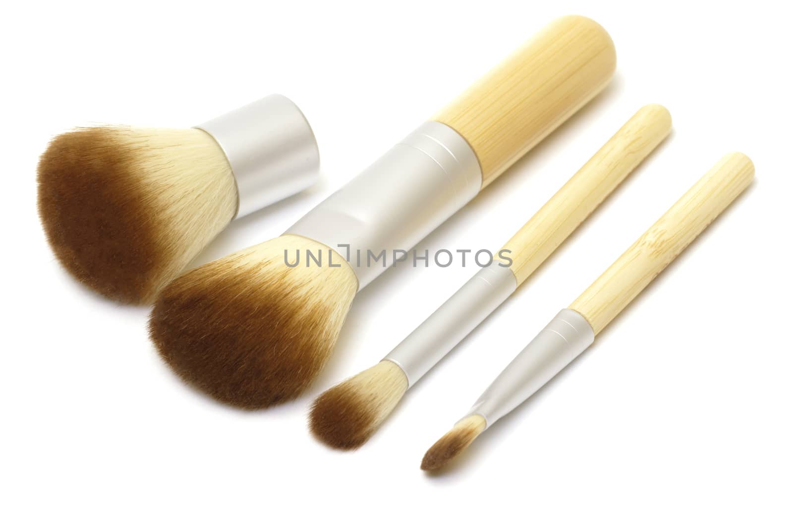 Makeup brushes on white background