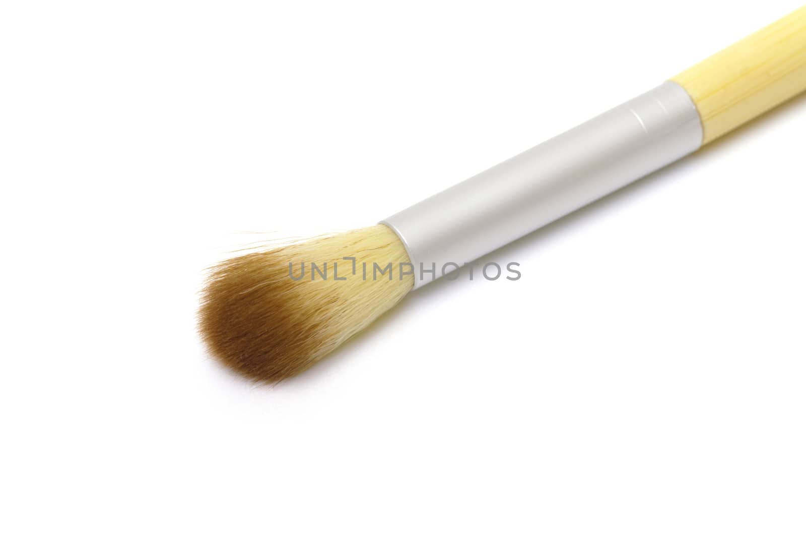 Makeup brush on white background