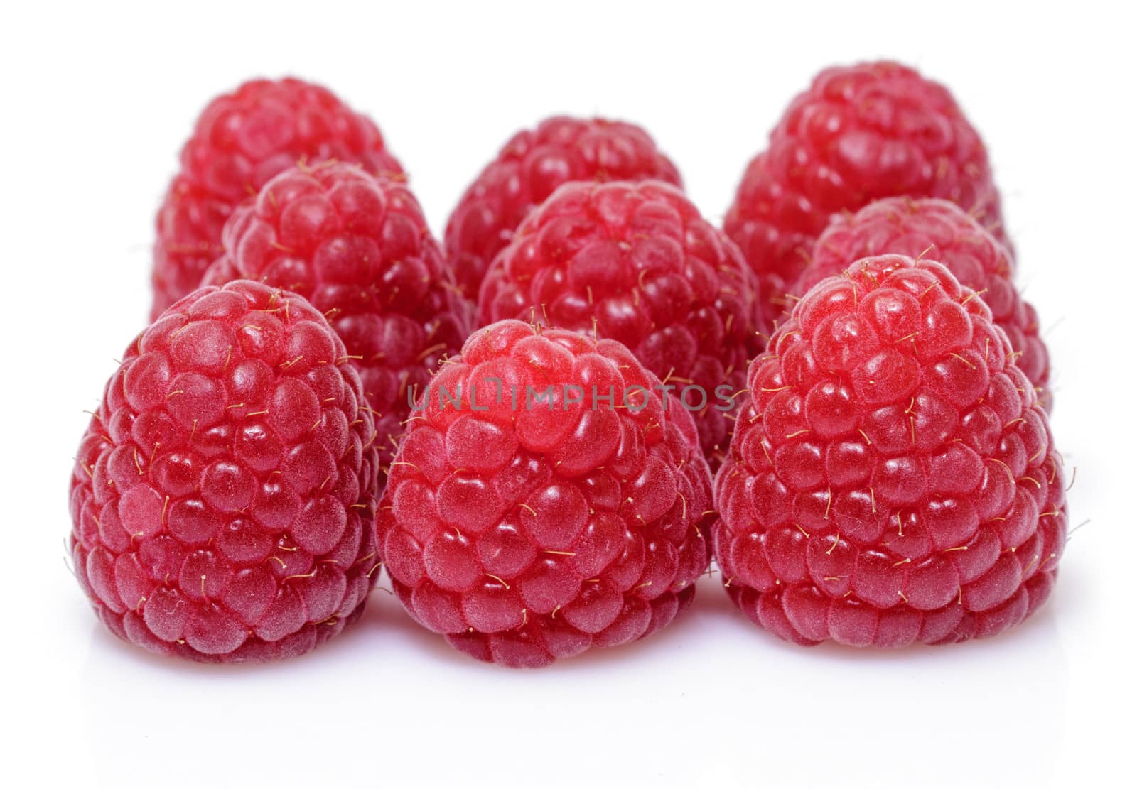 Fresh raspberry on white background