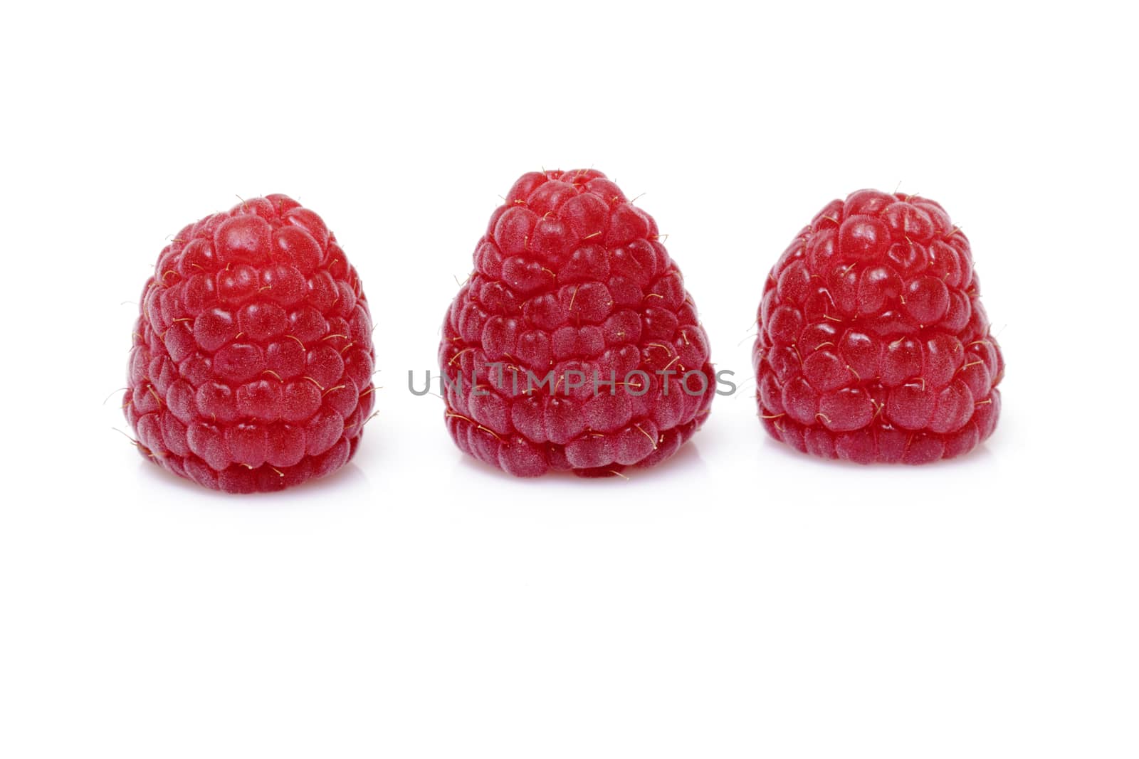 Fresh raspberry on white background