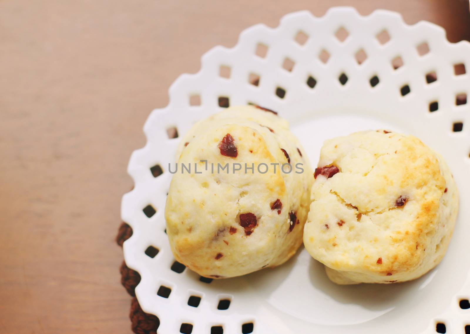 Top view of freshly baked scones with retro filter effect by nuchylee