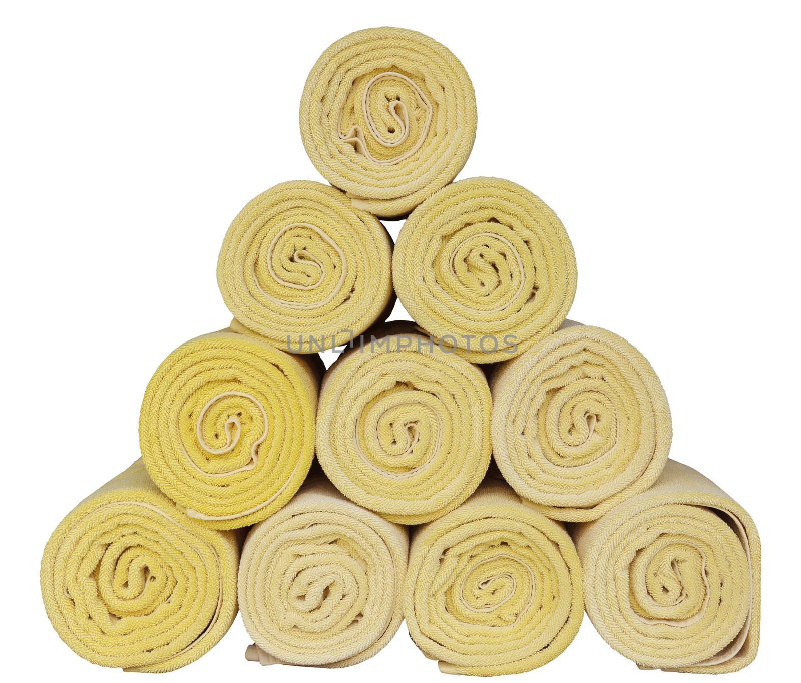 Rolled up spa towels on white