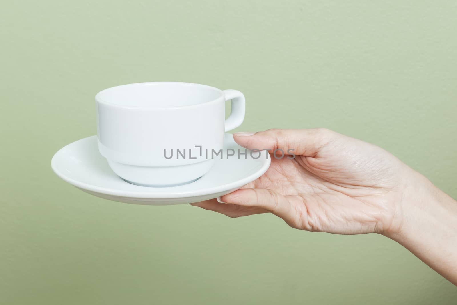 cup of tea or coffee in hand