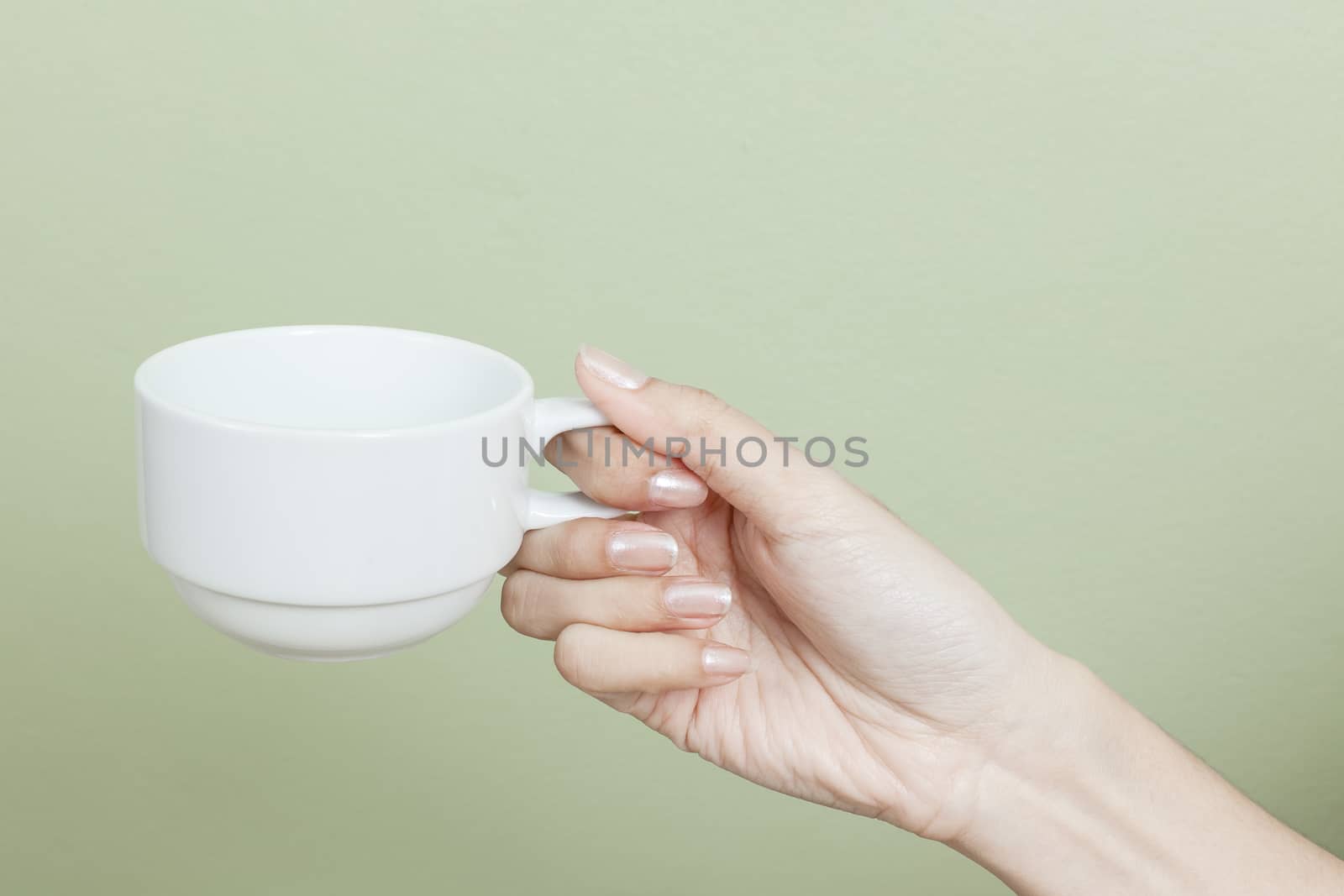 cup of tea or coffee in hand