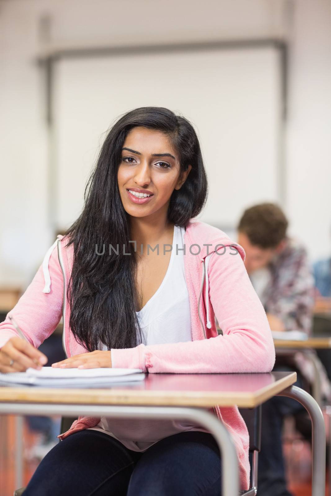 Portrait of a female student in the classroom by Wavebreakmedia