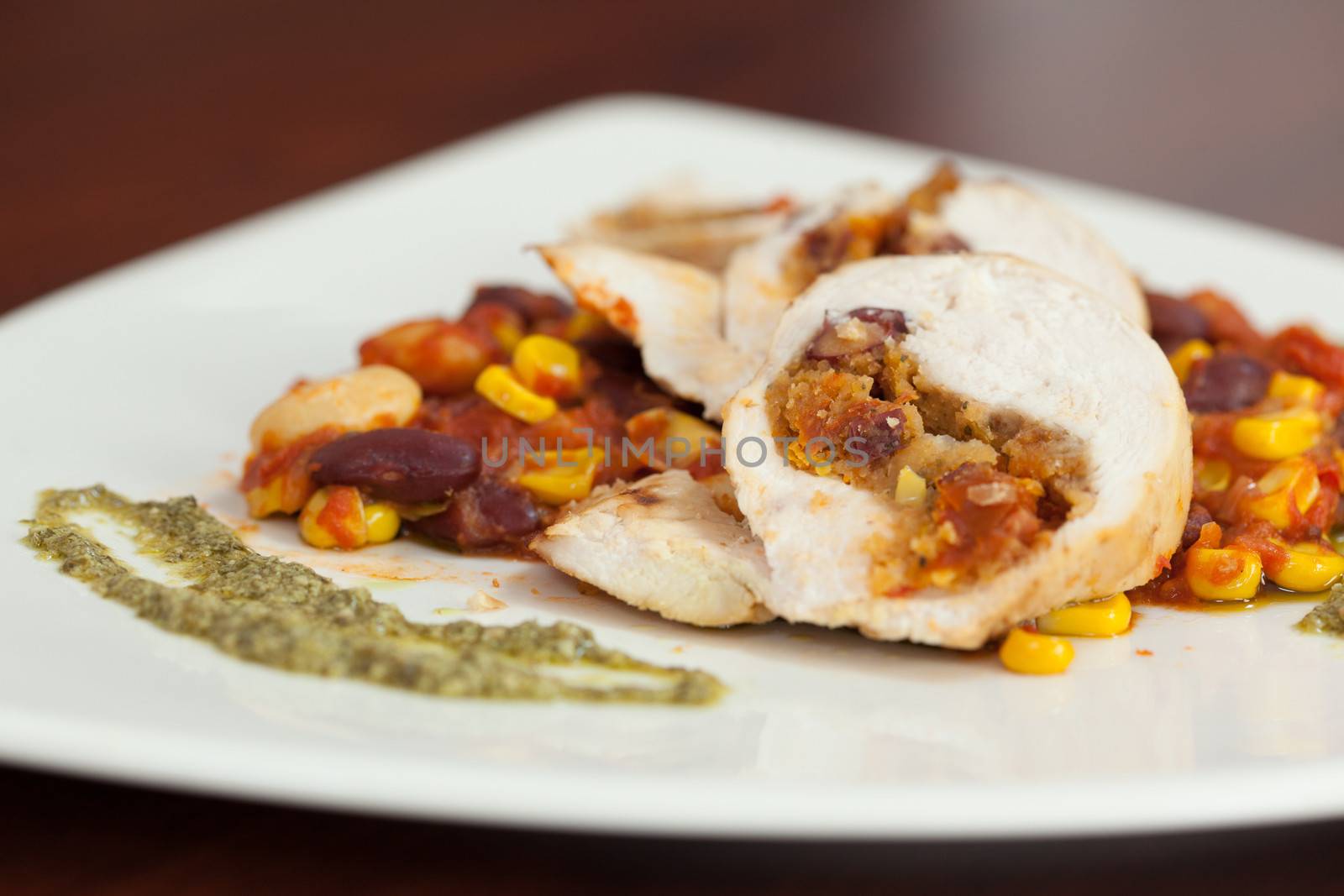 Close up of chicken dish with salsa by Wavebreakmedia