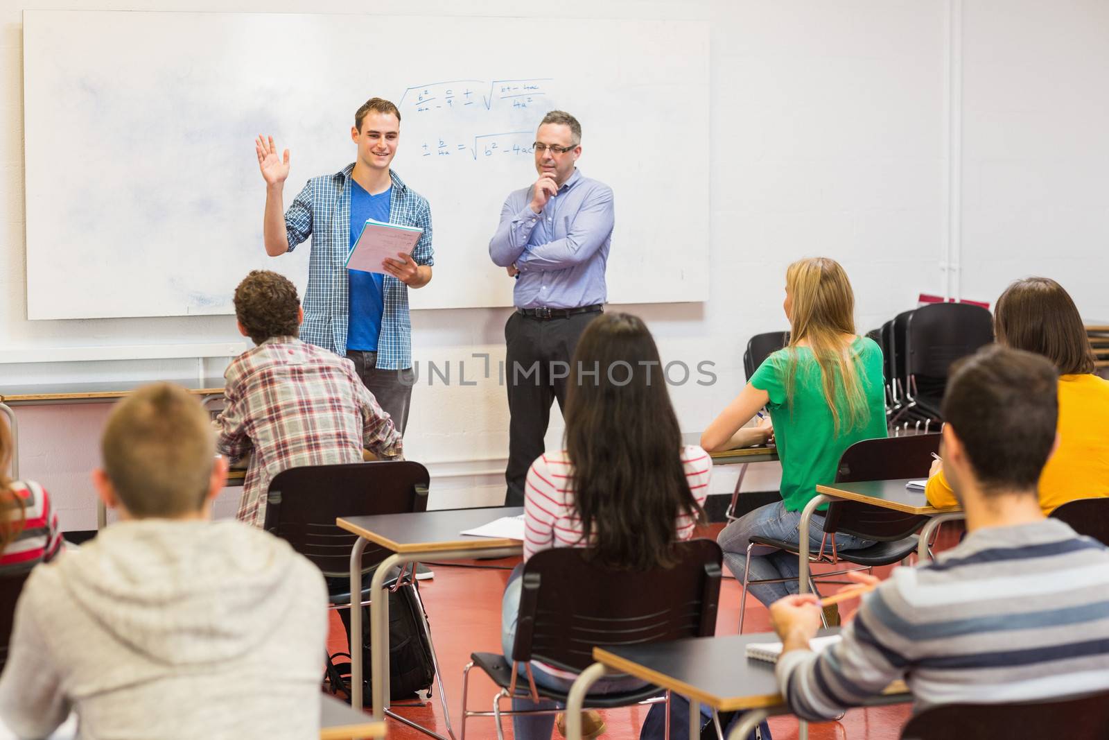 Teacher with students in the classroom by Wavebreakmedia