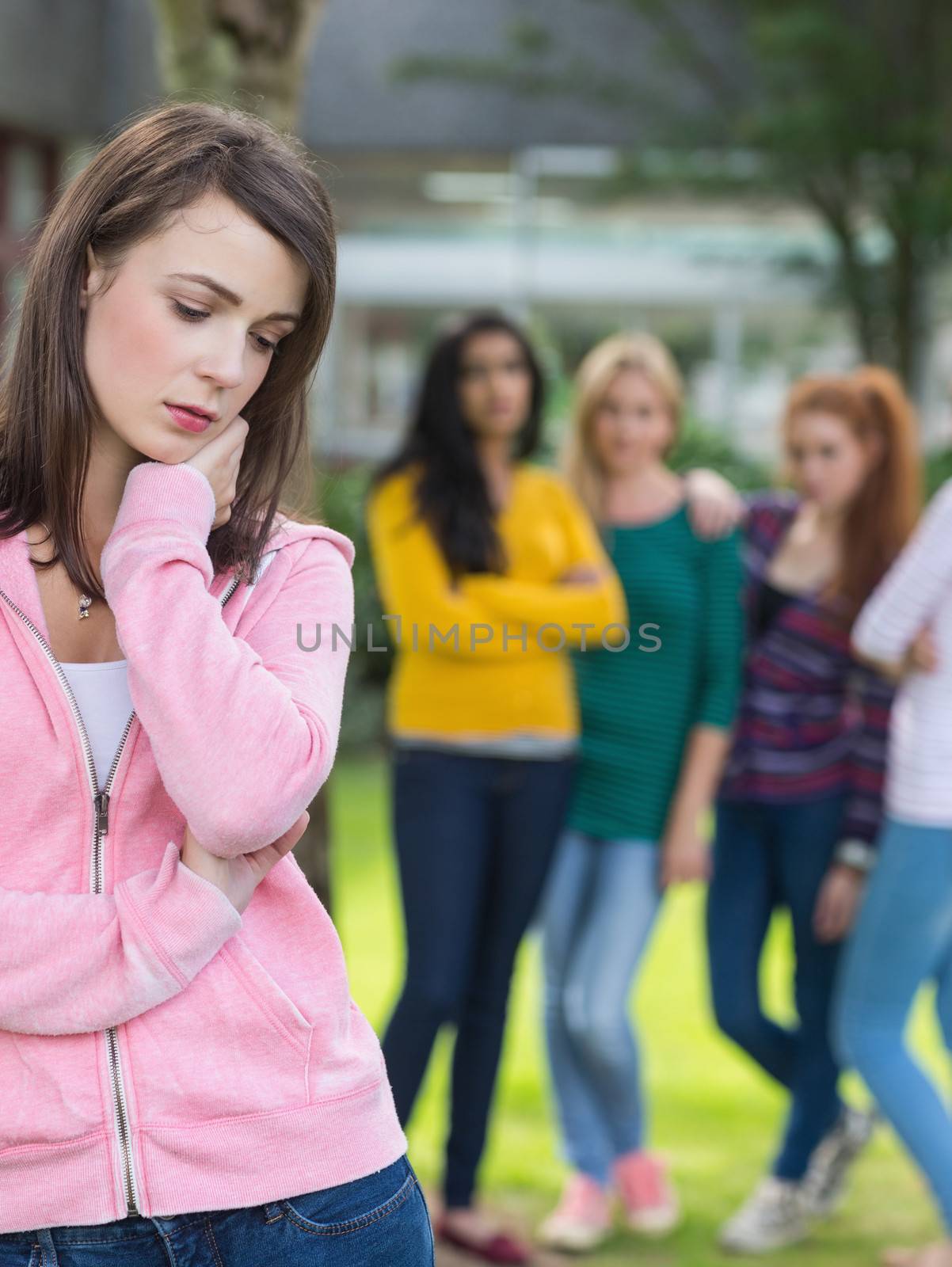 Female student being bullied by other group of students