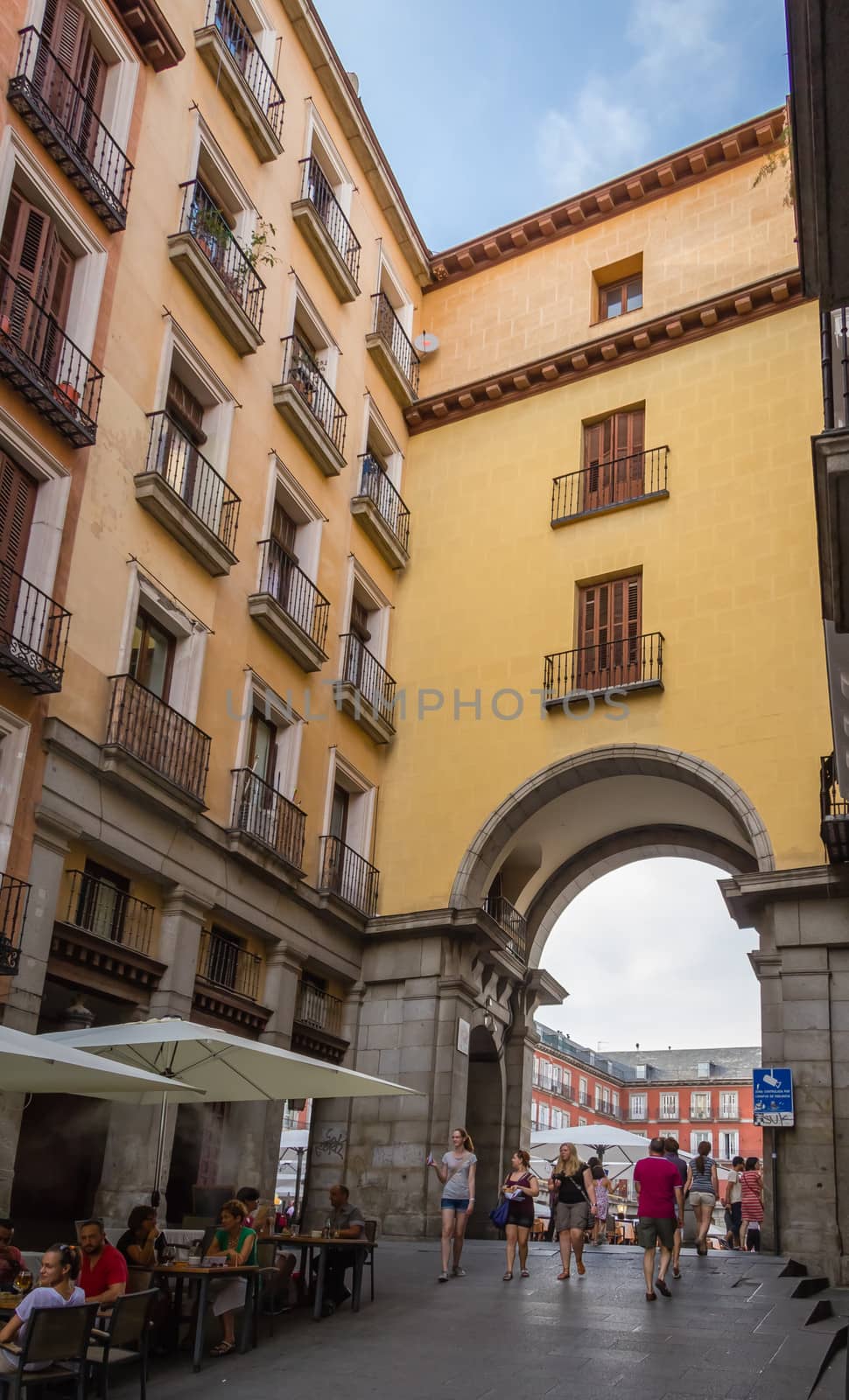 MADRID, SPAIN - SEPTEMBER 2: Archway entrance to the central square of Plaza Mayor, in Madrid, Spain, on September 2, 2013
