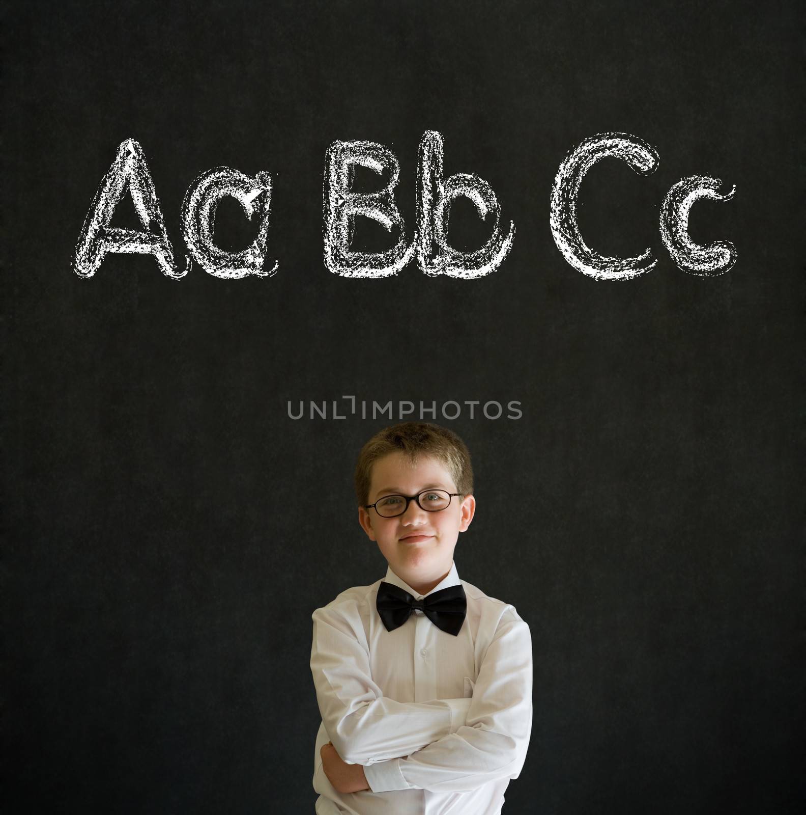 Thinking boy business man with learn English language alphabet by alistaircotton