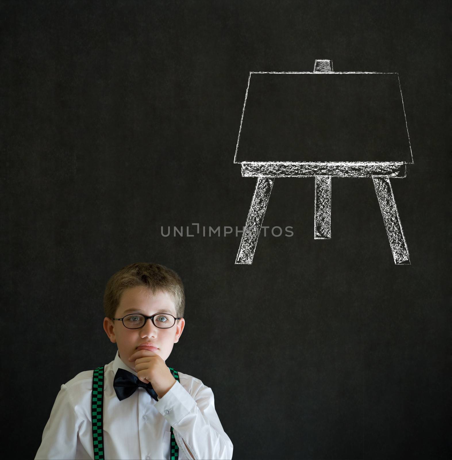 Thinking boy business man with learn art chalk easel by alistaircotton
