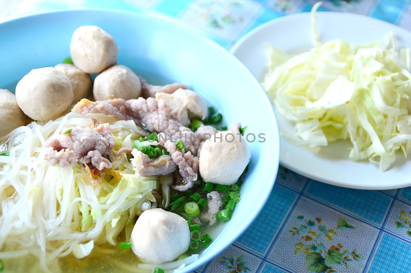 noodle soup with meat ball and fresh vegetable by Lekchangply