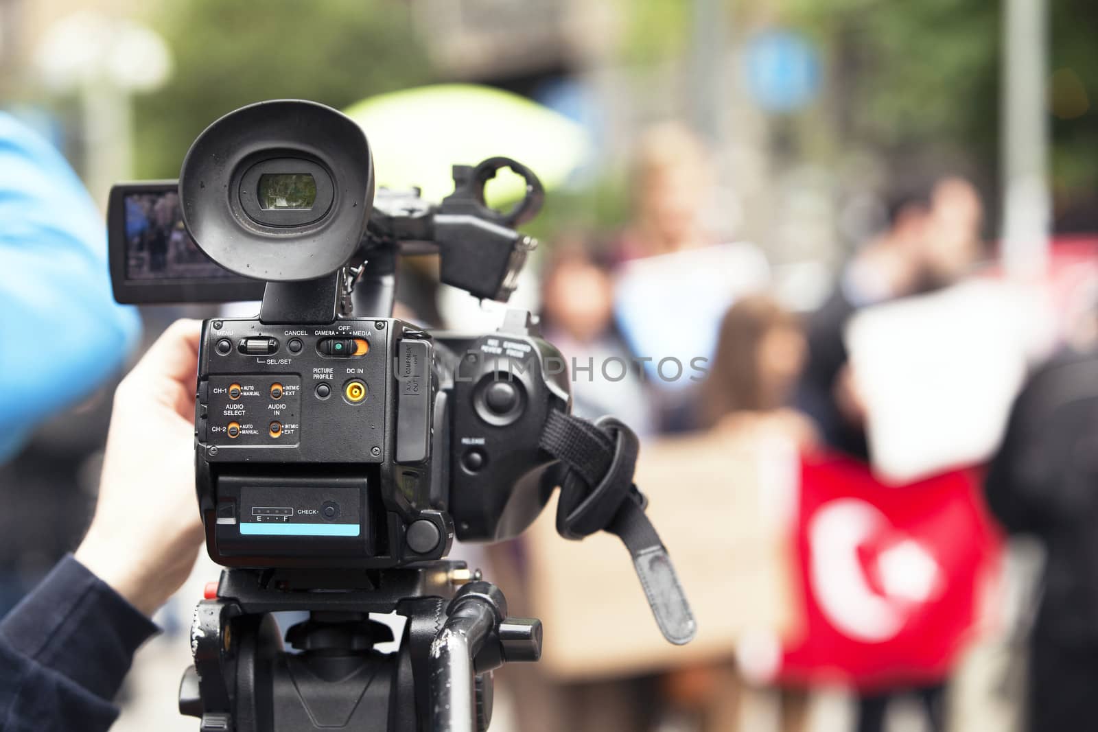 Covering a street protest using video camera