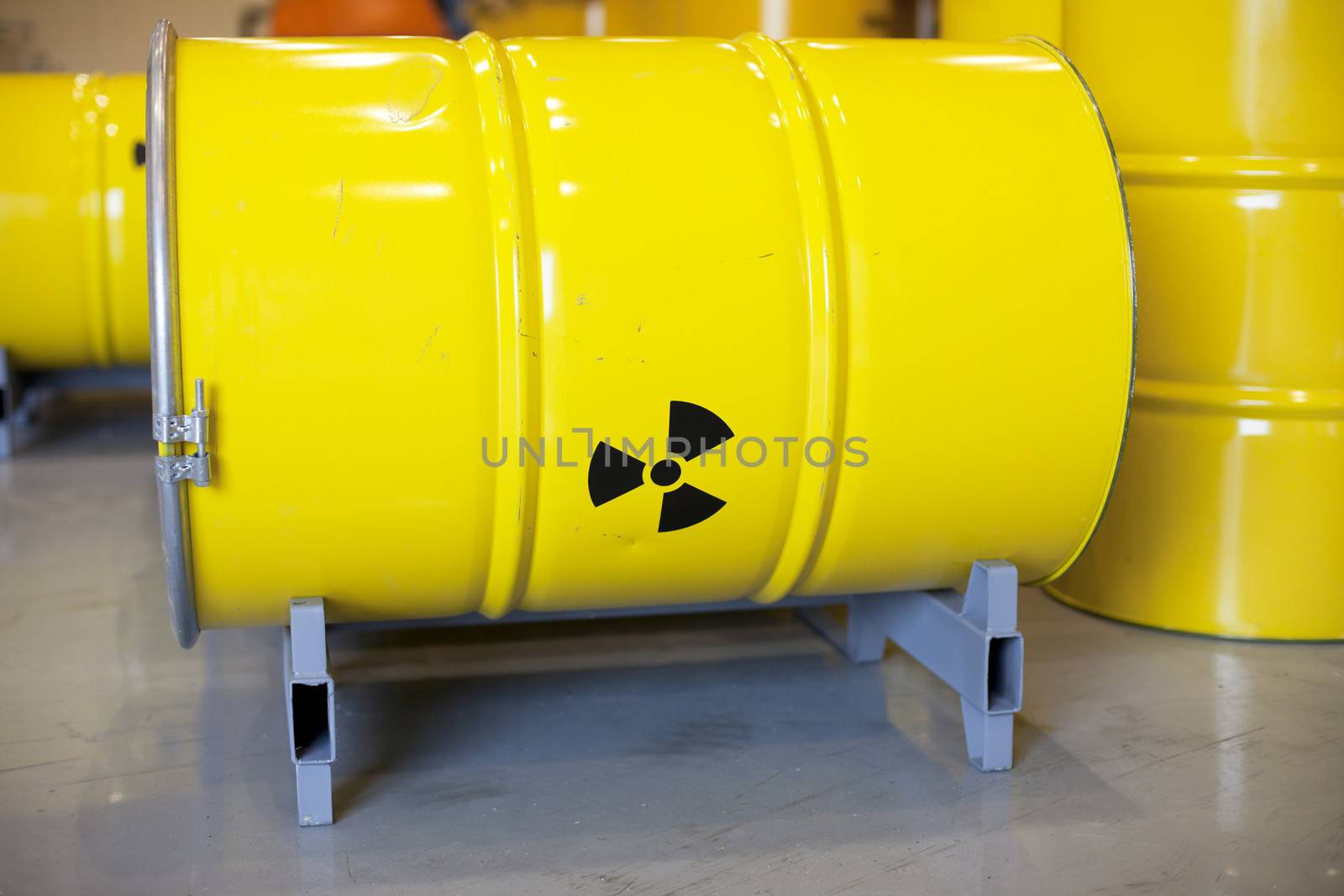 Yellow barrels with radioactive waste disposal