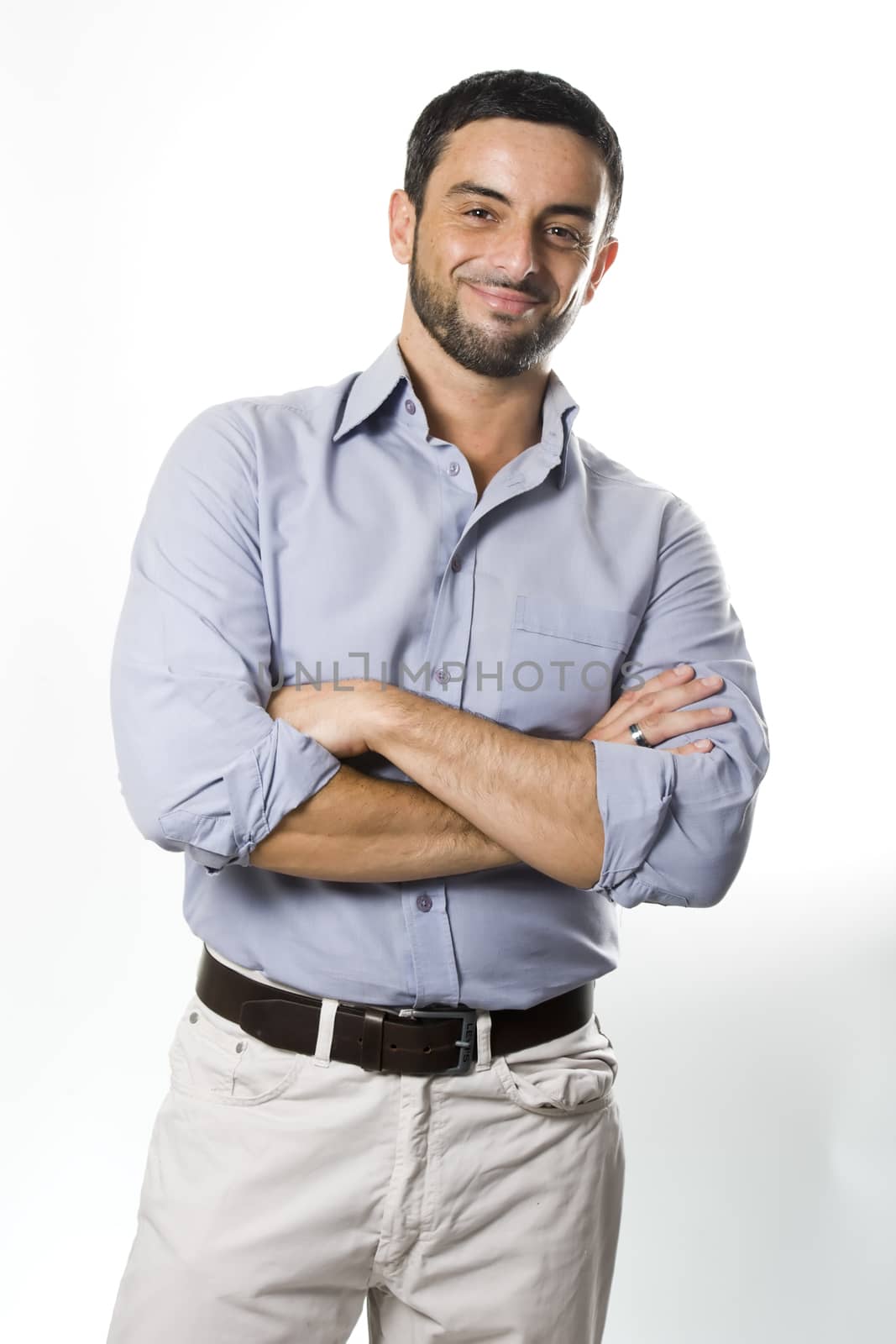 Young Man Arms Folded Isolated White Background by ocusfocus