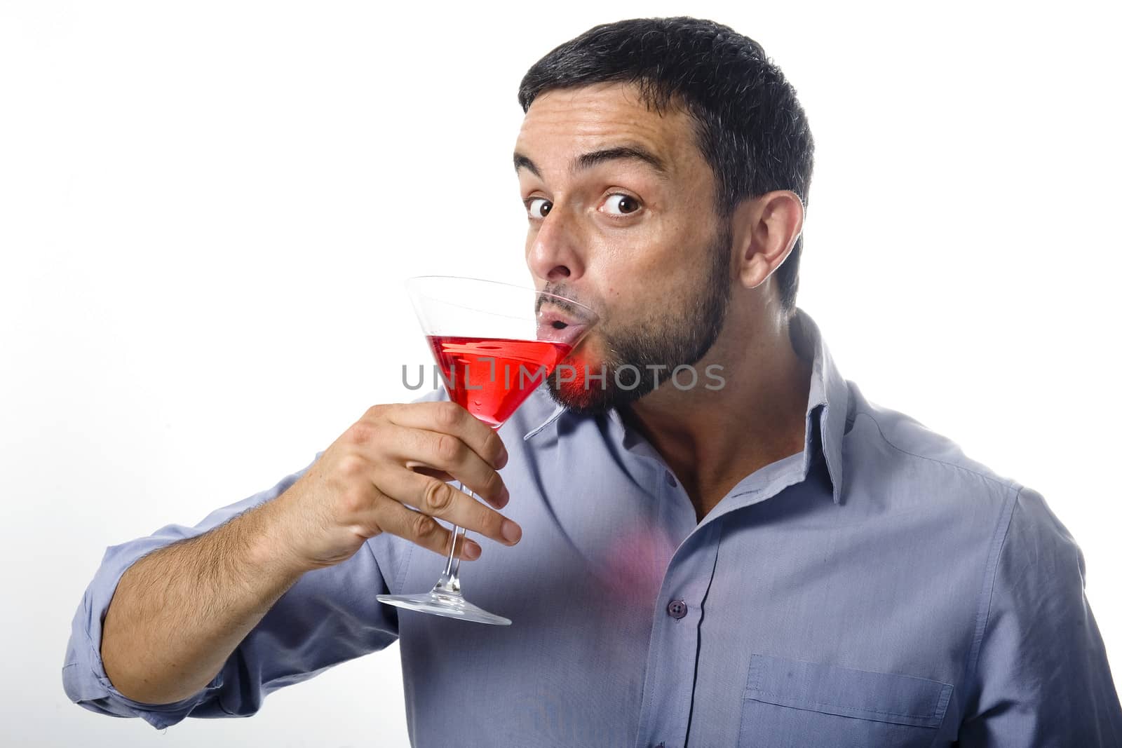 Young Man with Beard Drinking Cocktail  Isolated on White Background