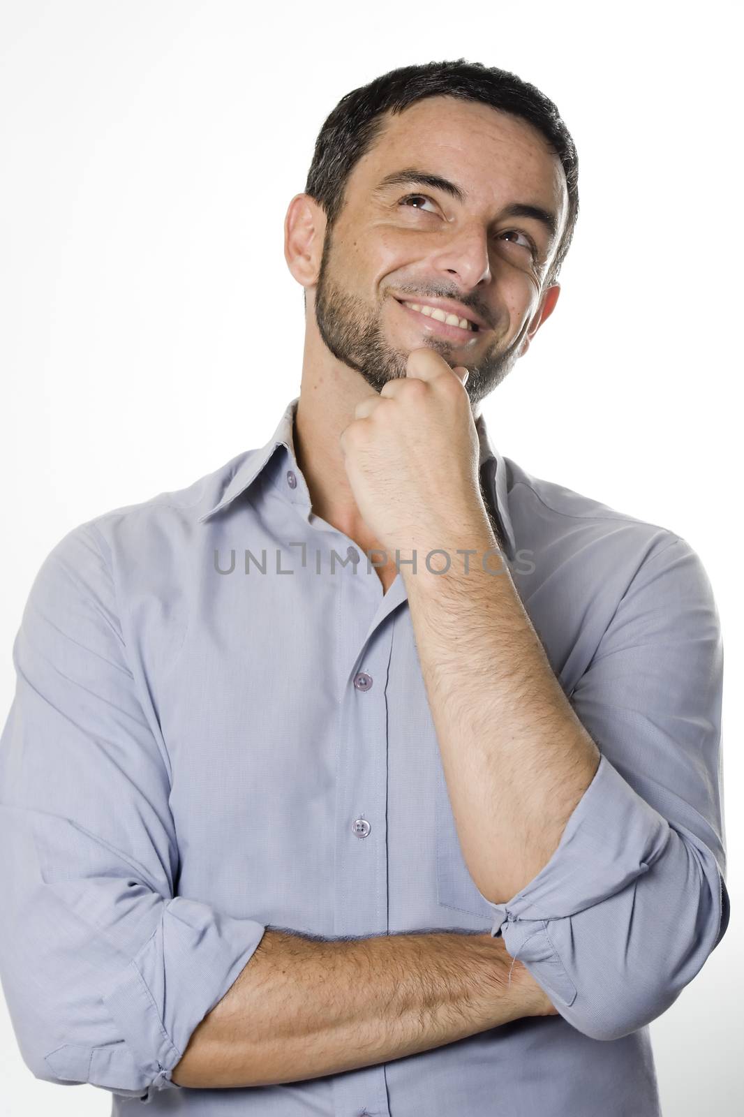 Happy Young Man with Beard Thinking Isolated White by ocusfocus