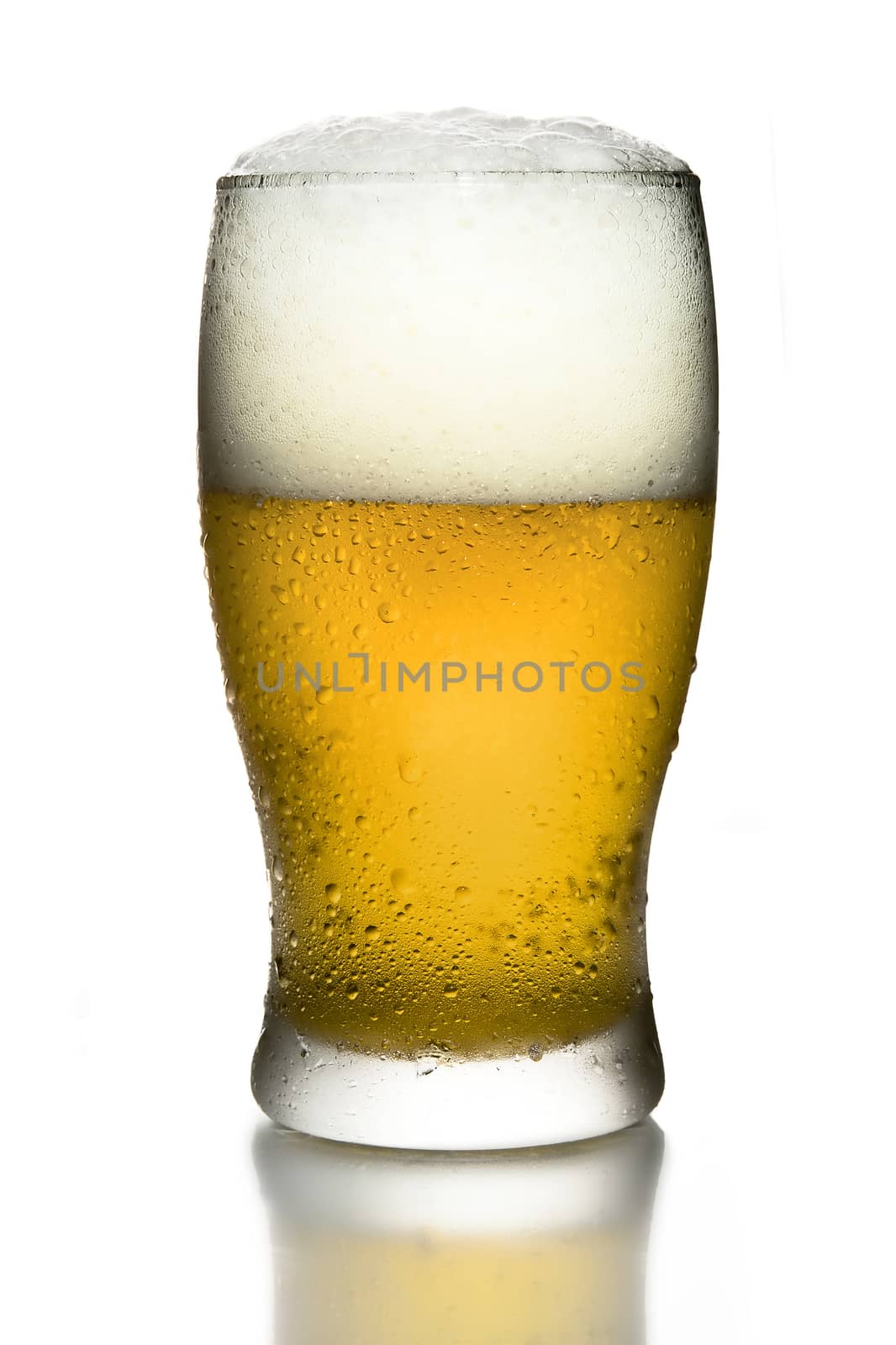Full Cold Frosted Glass of Bear with foam on top in white background