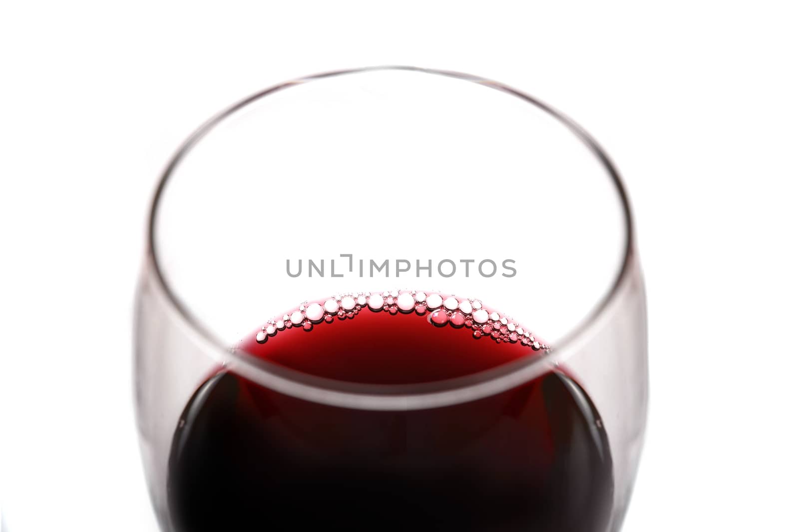Glass of Red Wine with bubbles isolated on white background