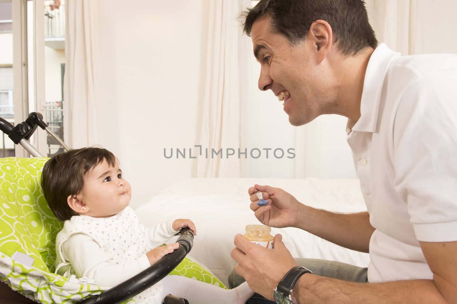 Father Feeding his cute Lovely Baby Girl 