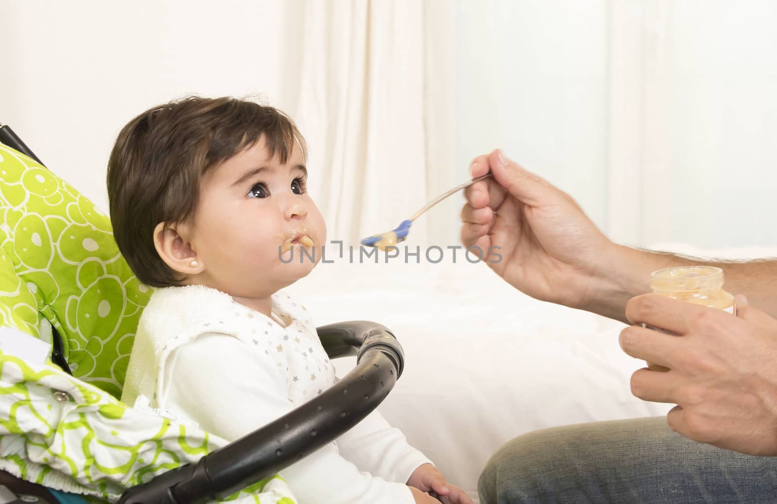 Father Feeding cute Lovely Baby Girl  by ocusfocus