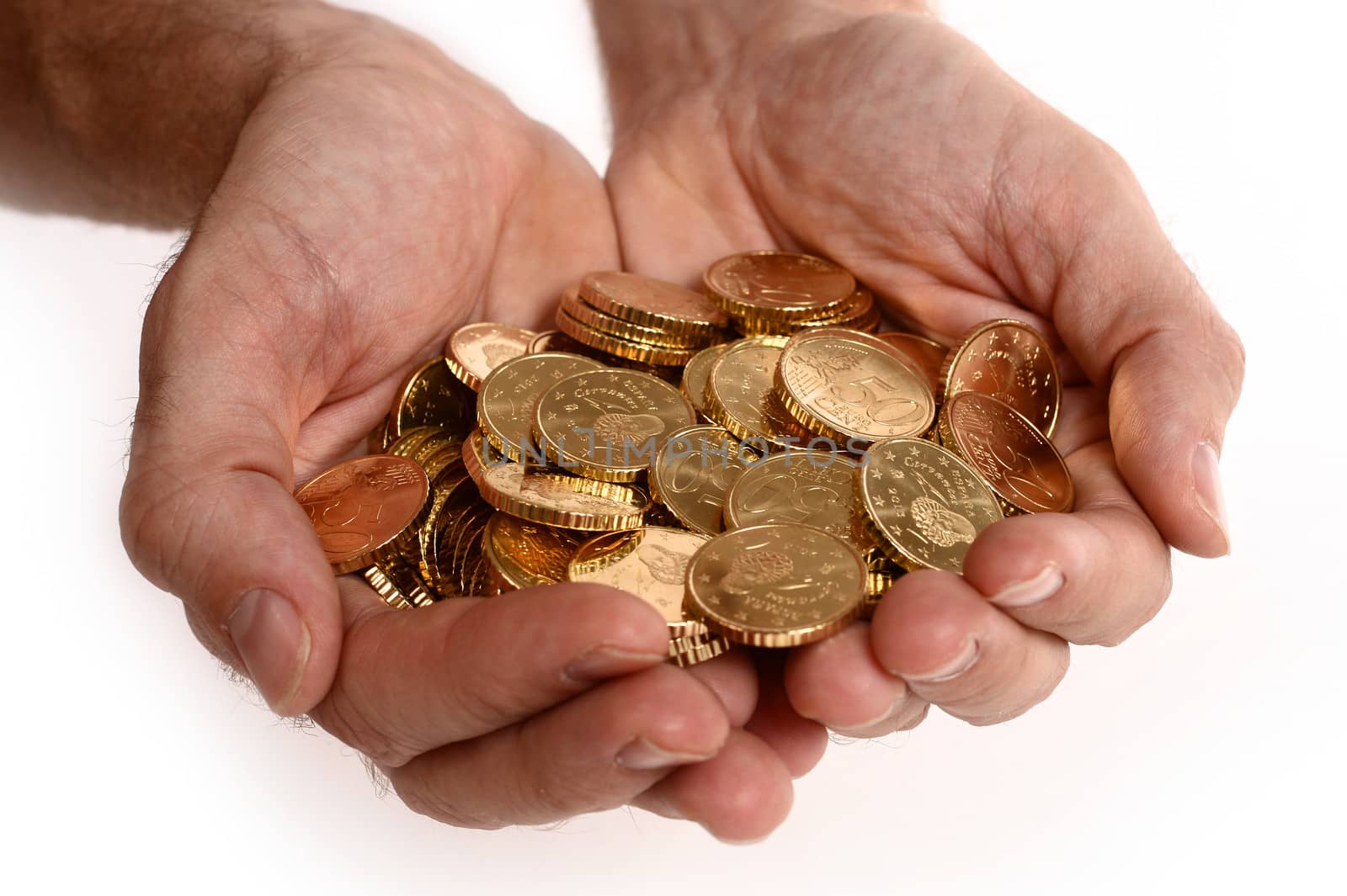 Man hands full of coins by ocusfocus