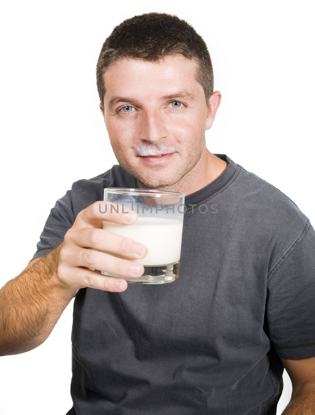 Happy Young  Man drinking Milk by ocusfocus