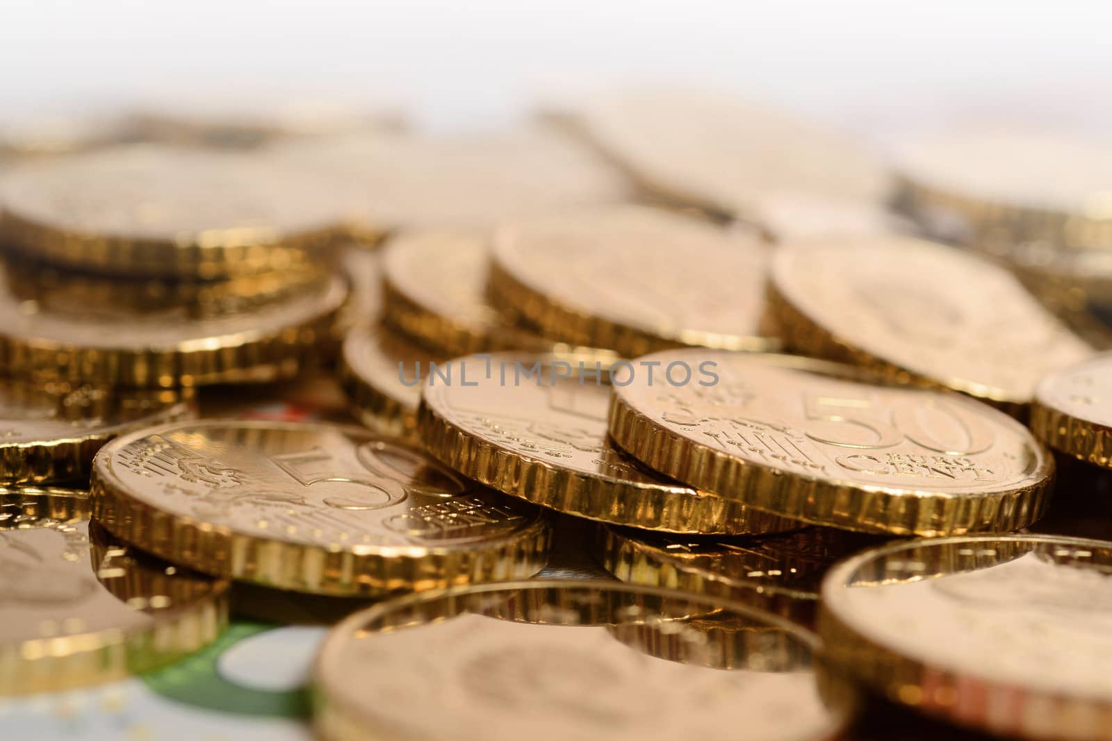 euro coins piled isolated by ocusfocus