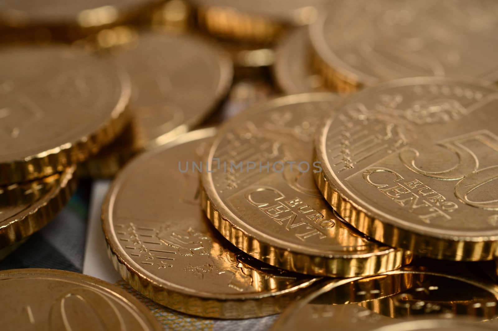 euro coins piled isolated by ocusfocus