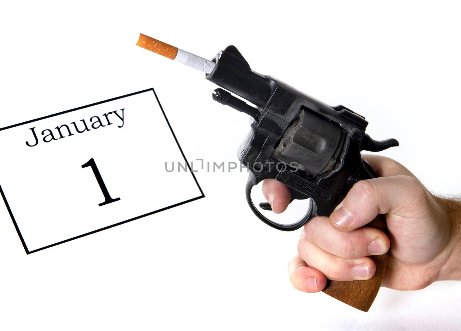New Years Resolution quit smoking concept with cigarette and gun