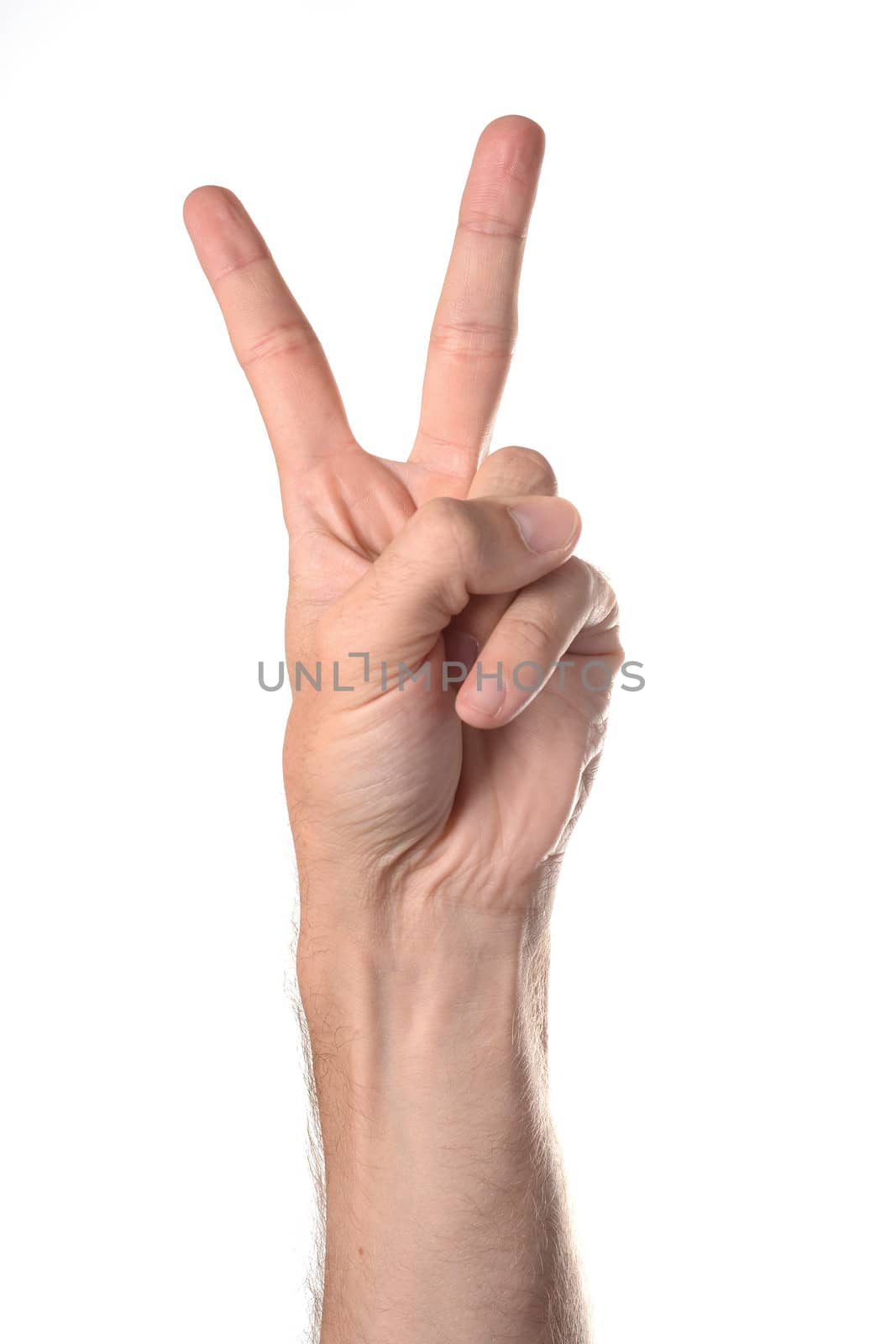 closeup of a caucasian hand giving the peace sign