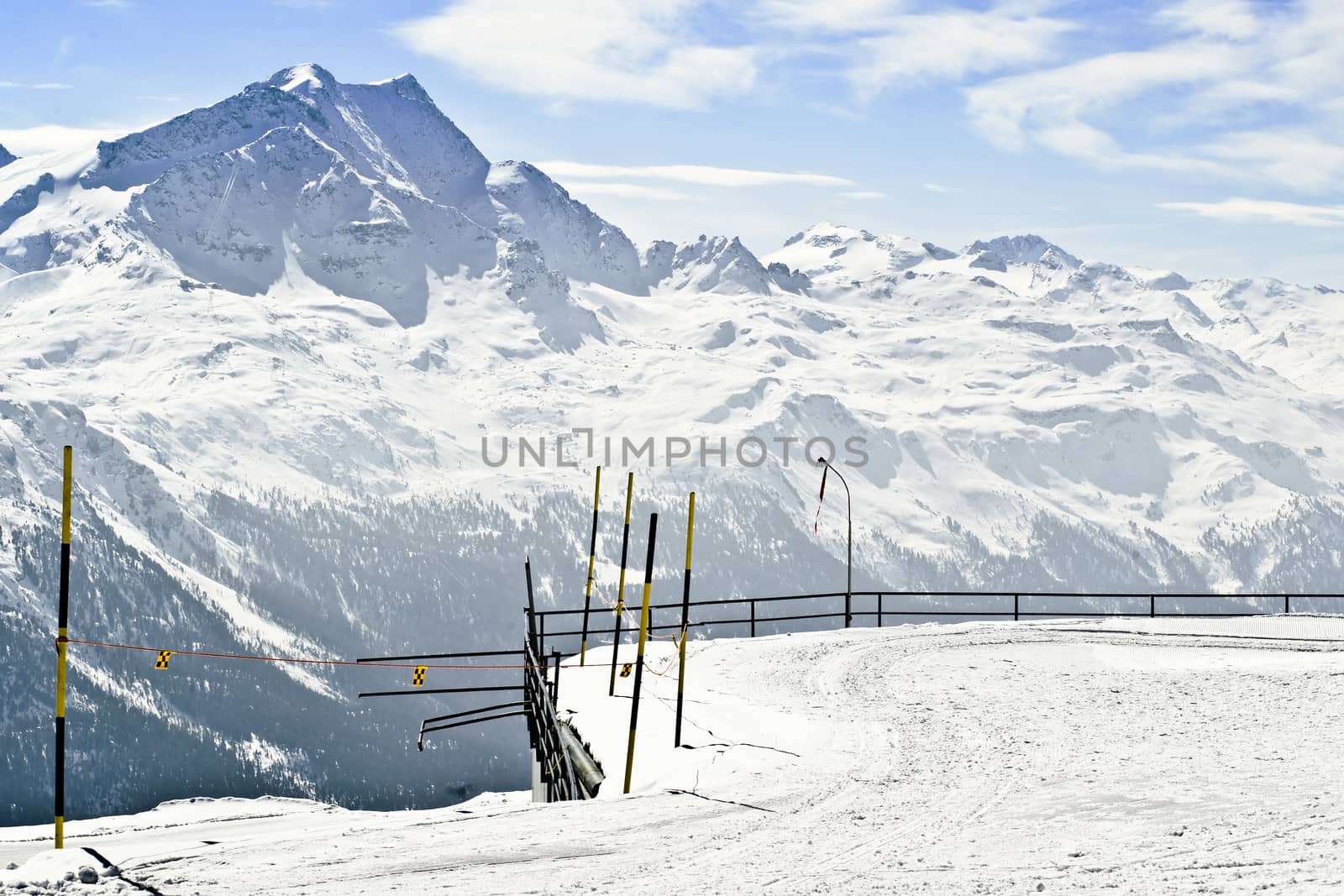 panoramic view of the swiss Alps covered with snow at a sunny winters day in Saint Moritz, Switzerland