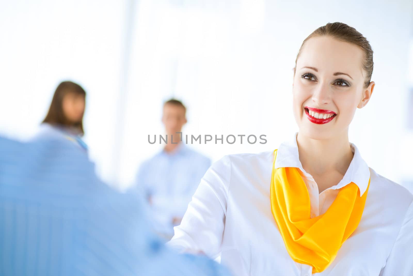 young business woman shaking hands with a client, the agreement between the partners