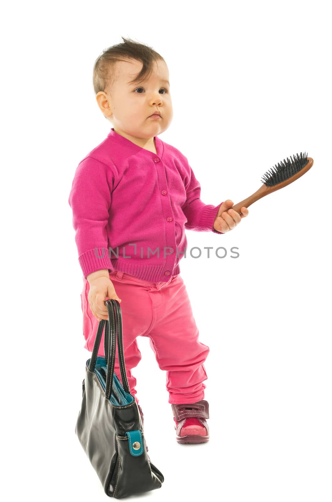 Baby girl with comb