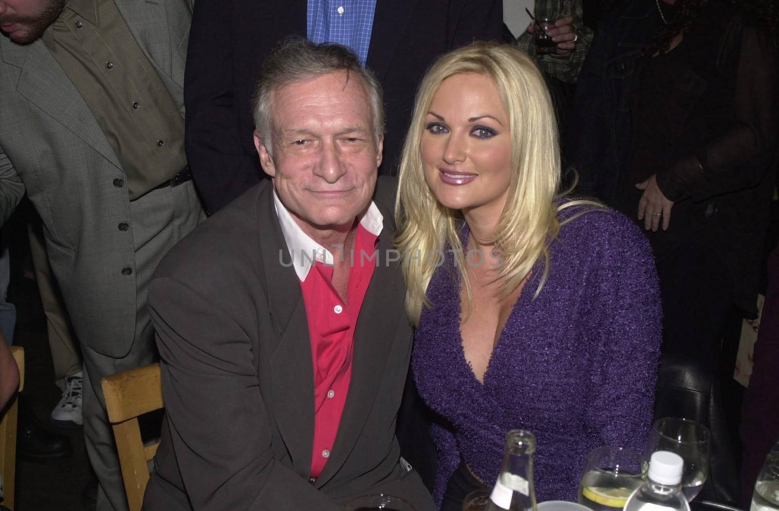 Hugh Hefner and Stacy Valentine at the party and fashion show for the documentary "The Girl Next Door" about a housewife turned adult film actress. West Hollywood, 05-09-00