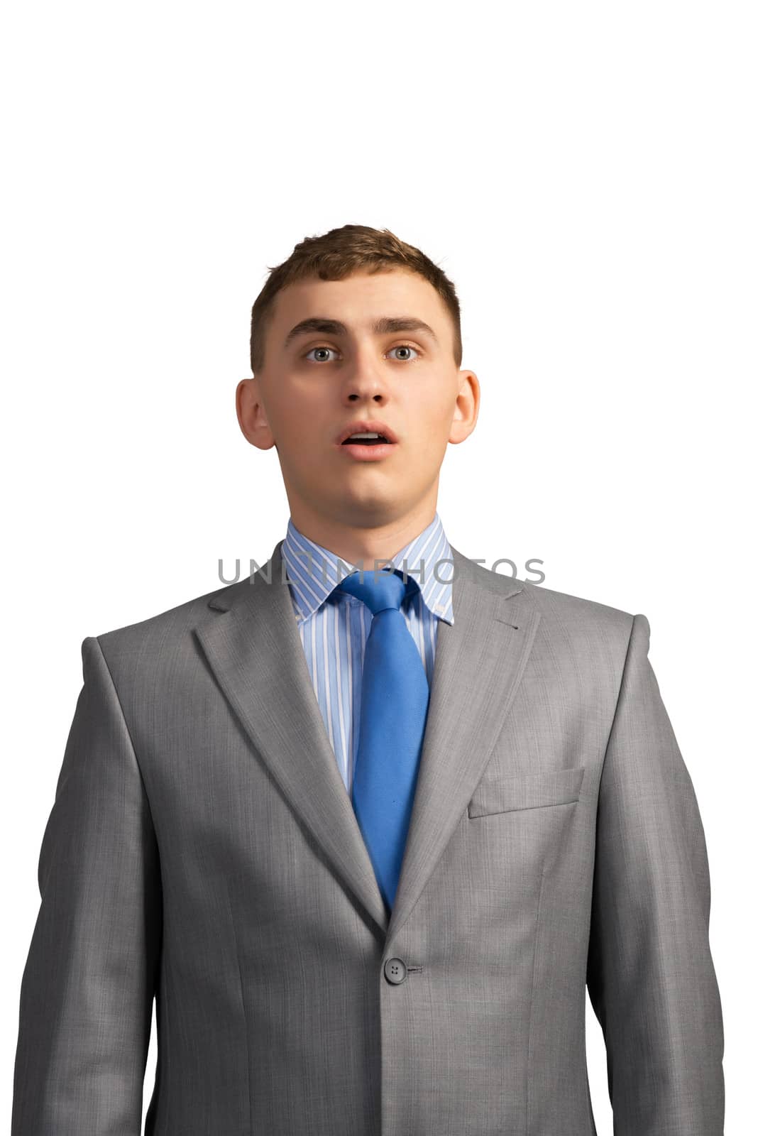 portrait of a young businessman, stares into the camera, isolated on white background