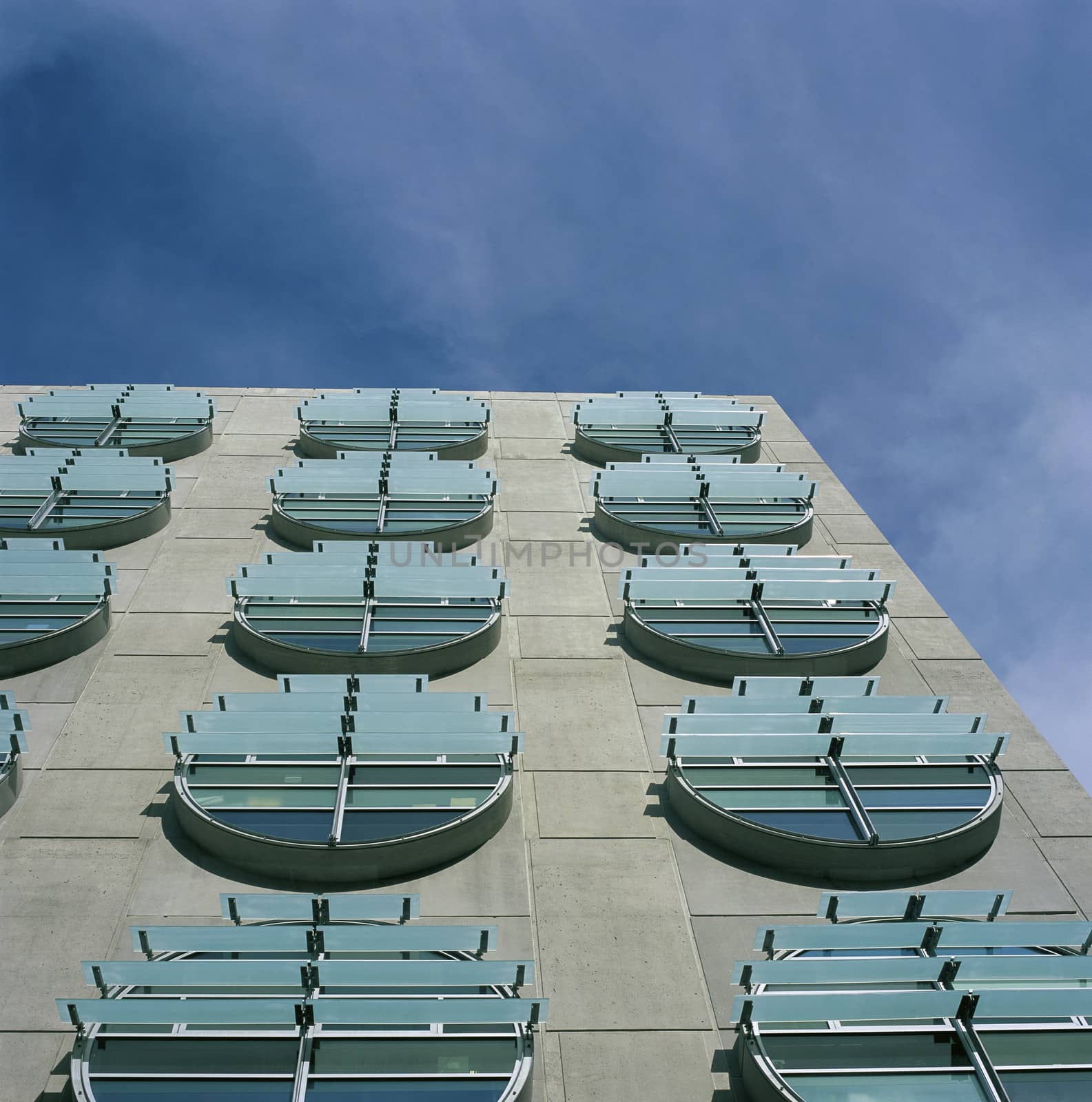 Modern circular windows on concrete structure