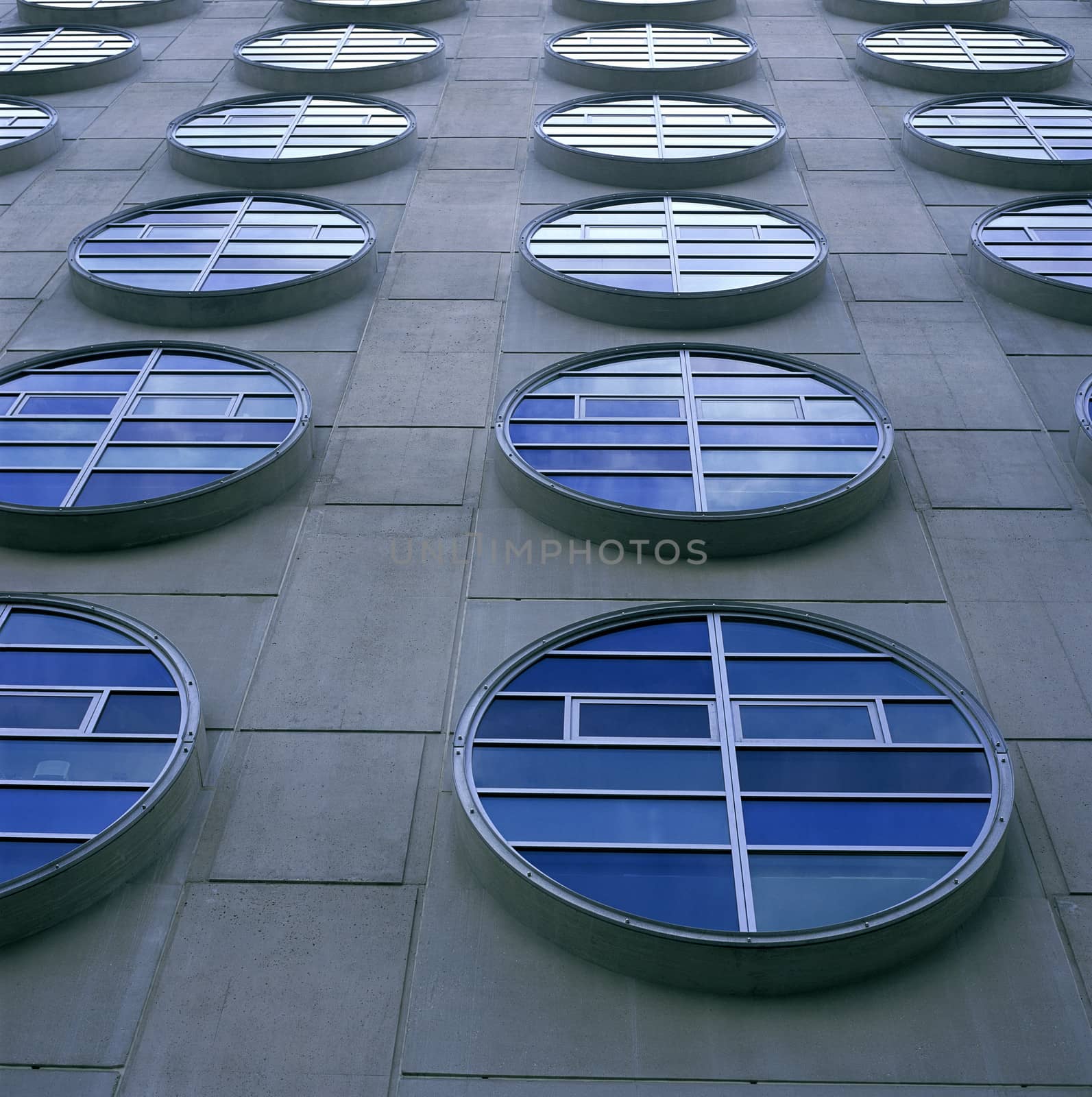 Modern circular windows on concrete structure
