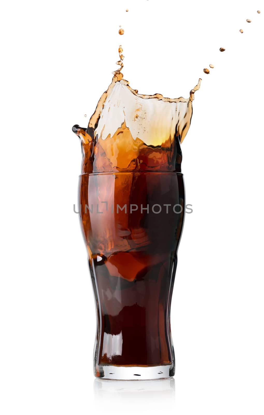 Splash of cola in glass isolated on white