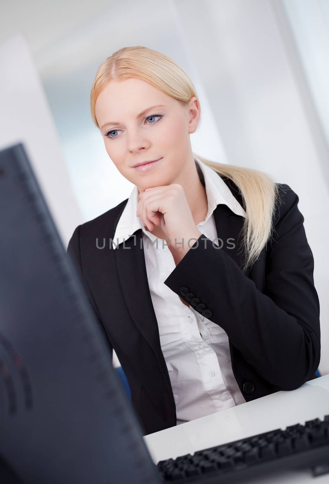 Successful young businesswoman working in the office