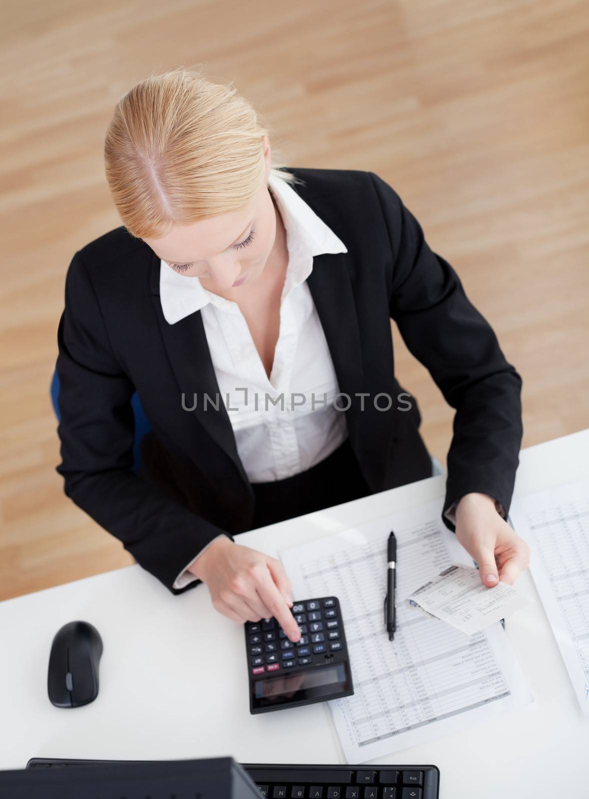 Cheerful accountant businesswoman by AndreyPopov