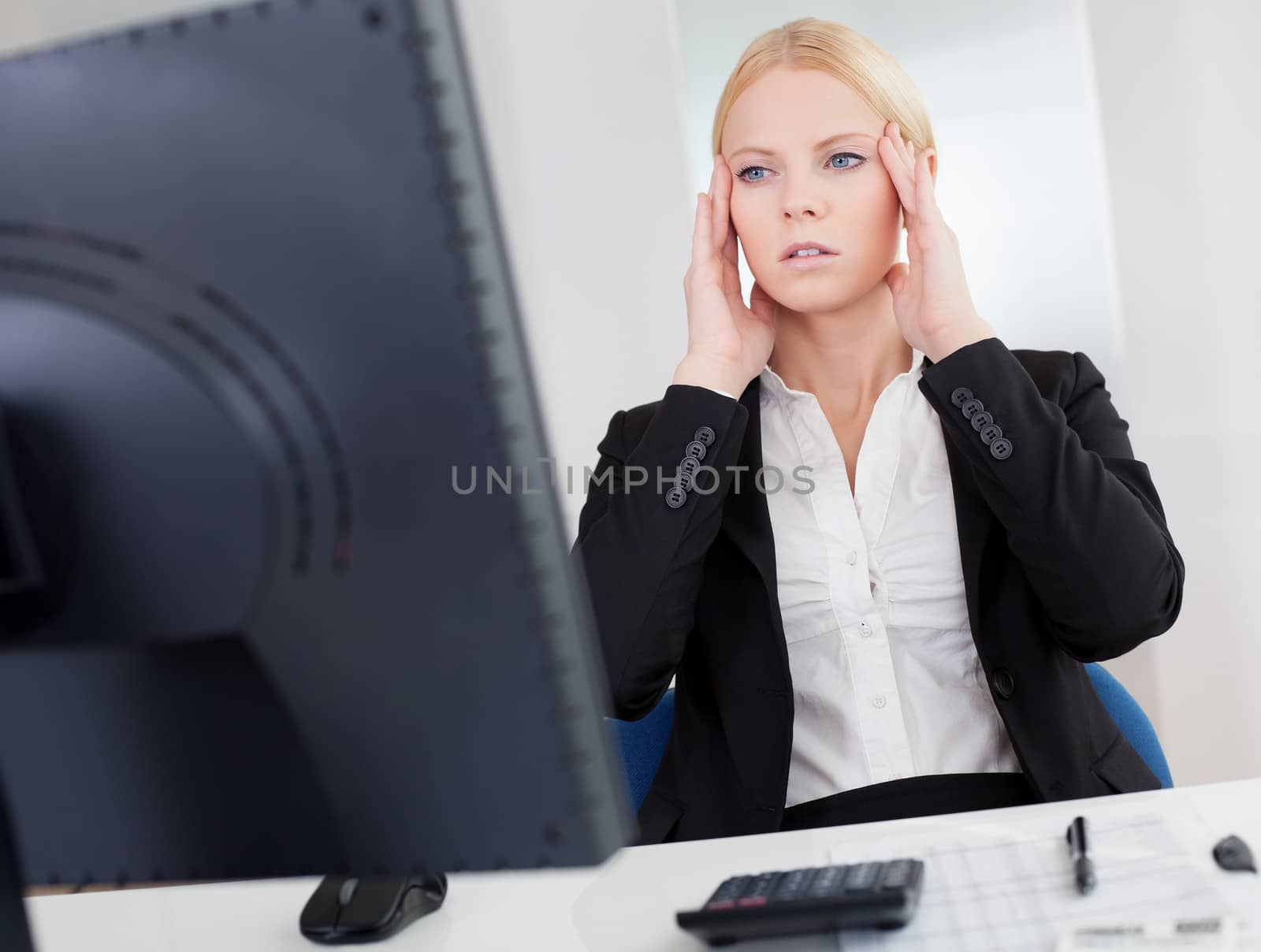 Cheerful young businesswoman with headache by AndreyPopov