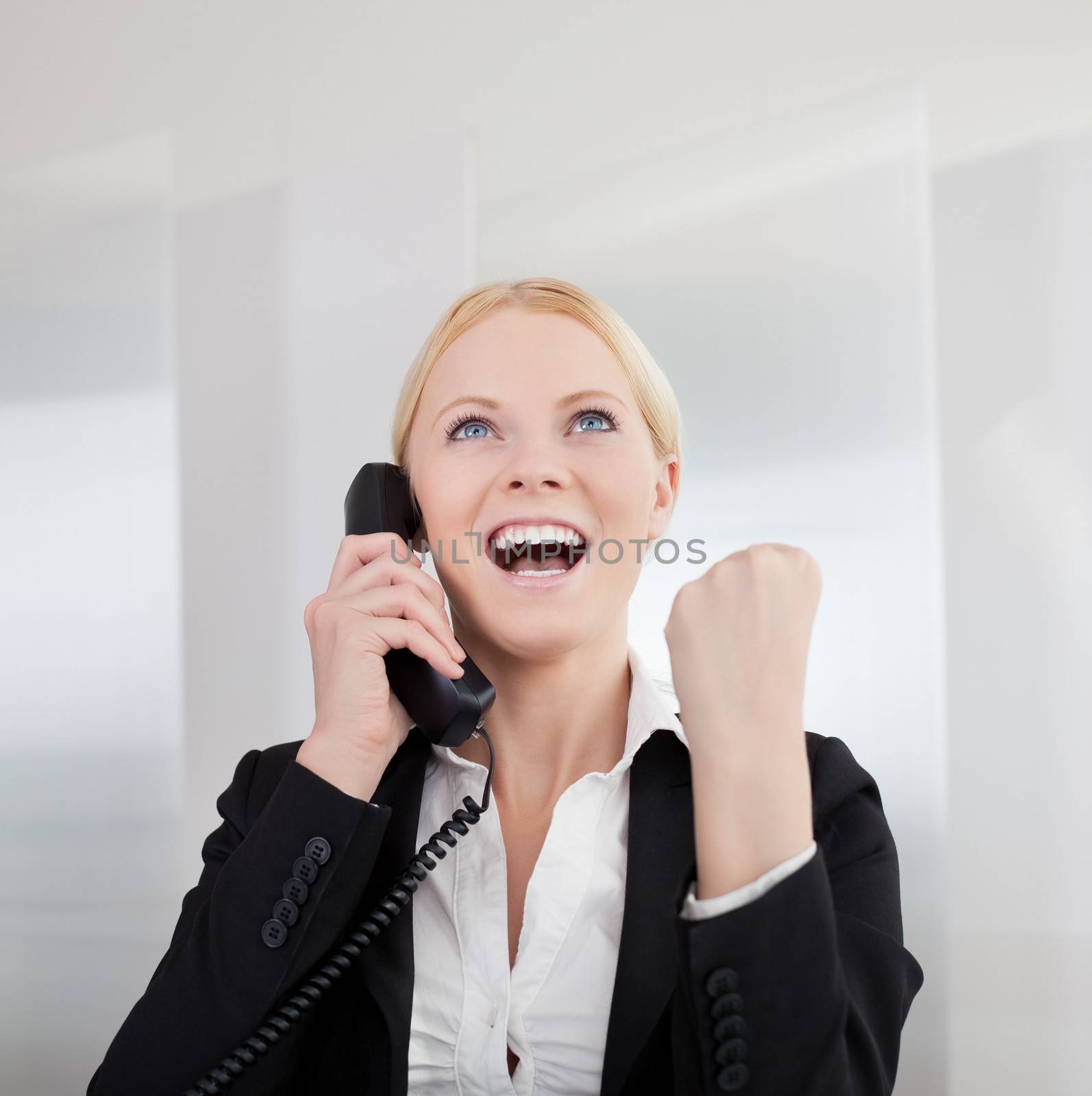 Beautiful businesswomen talking on the phone in the office