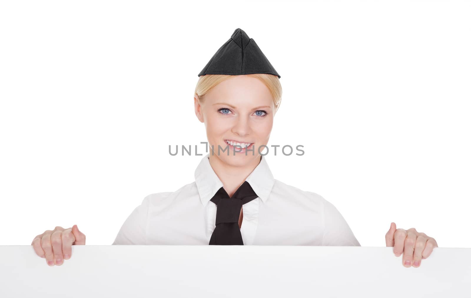 Portrait of beautiful young stewardess. Isolated on white