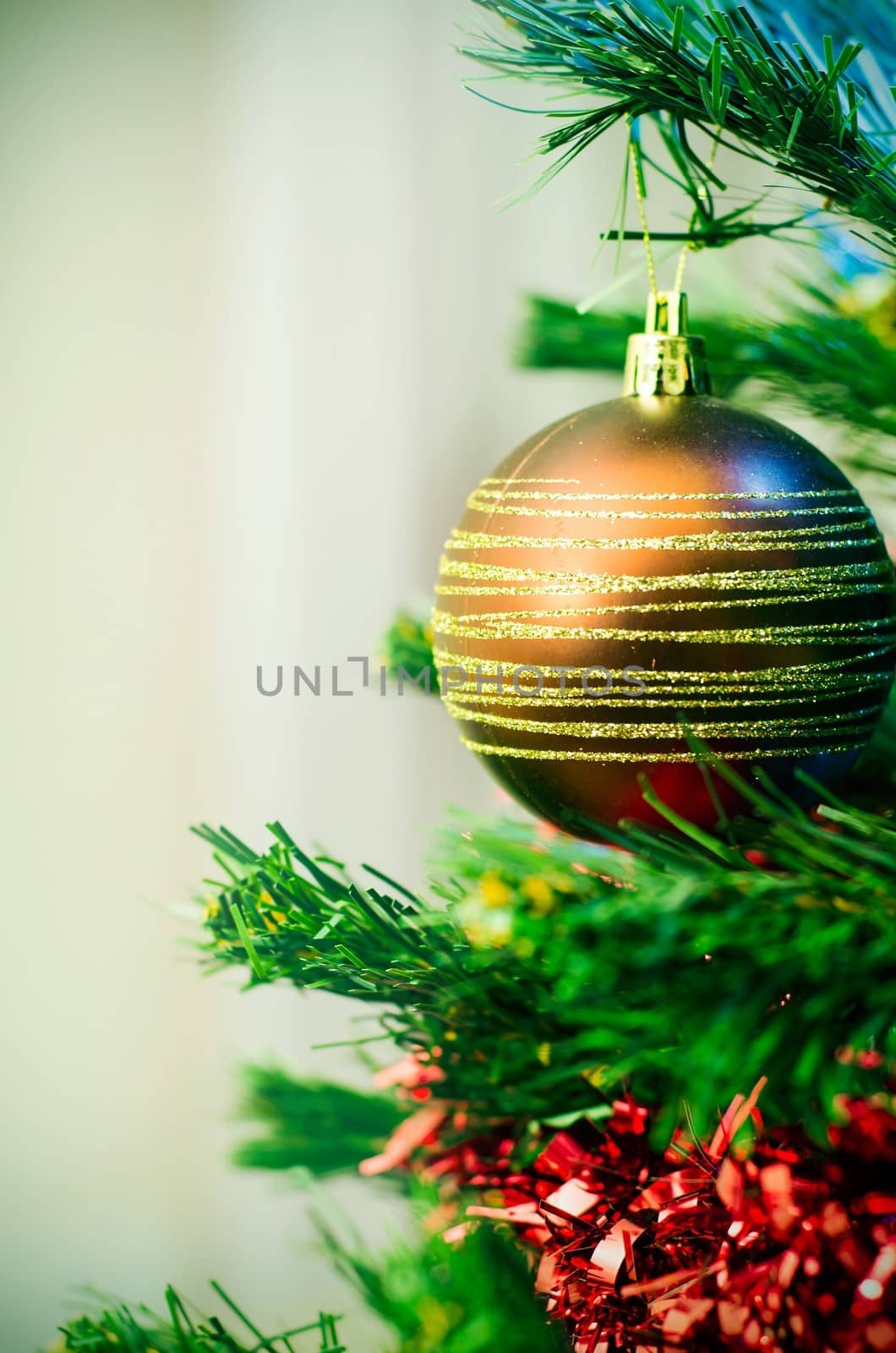 Closeup of christmas tree with bauble 