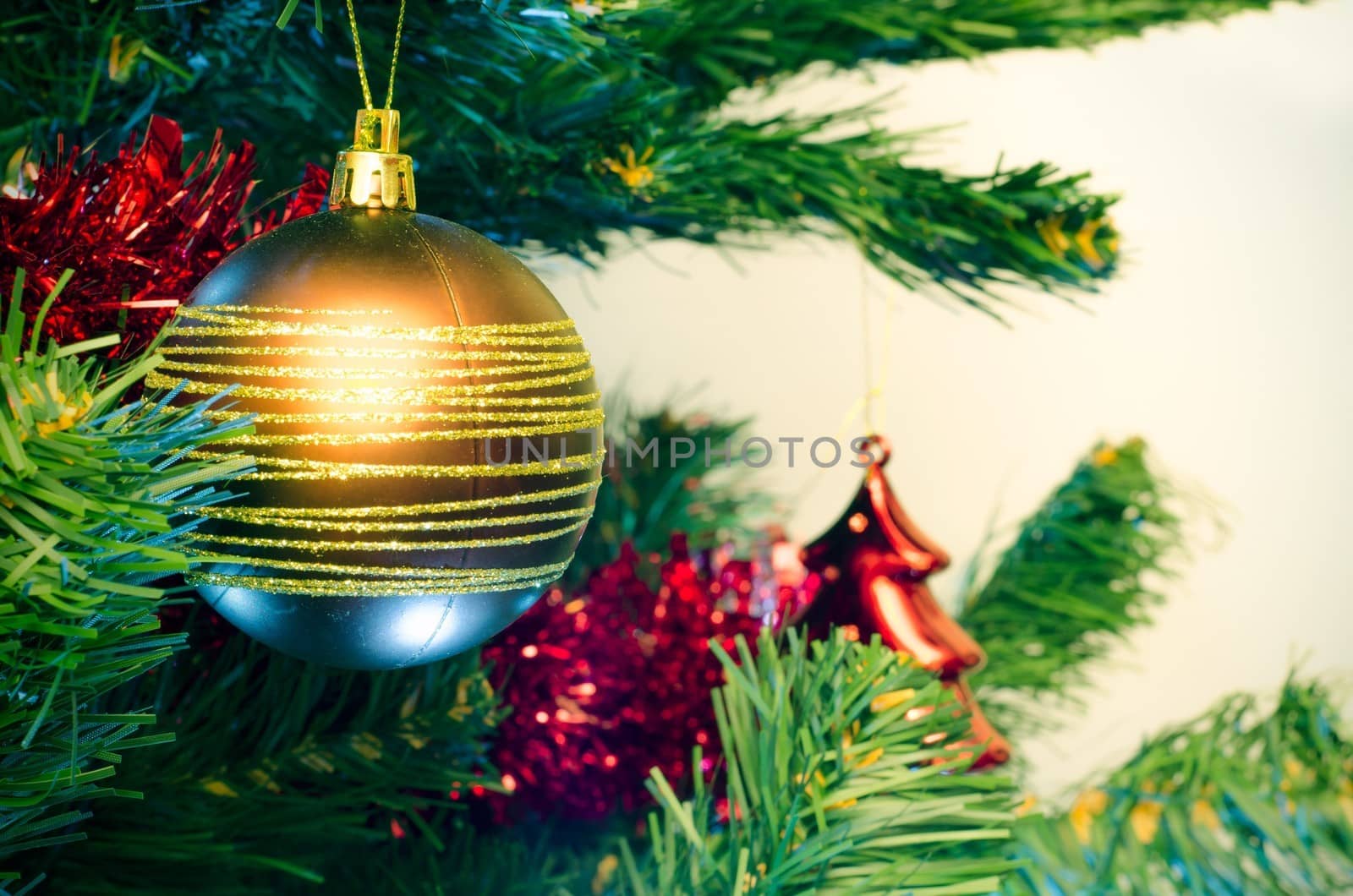 Closeup of christmas tree with bauble 