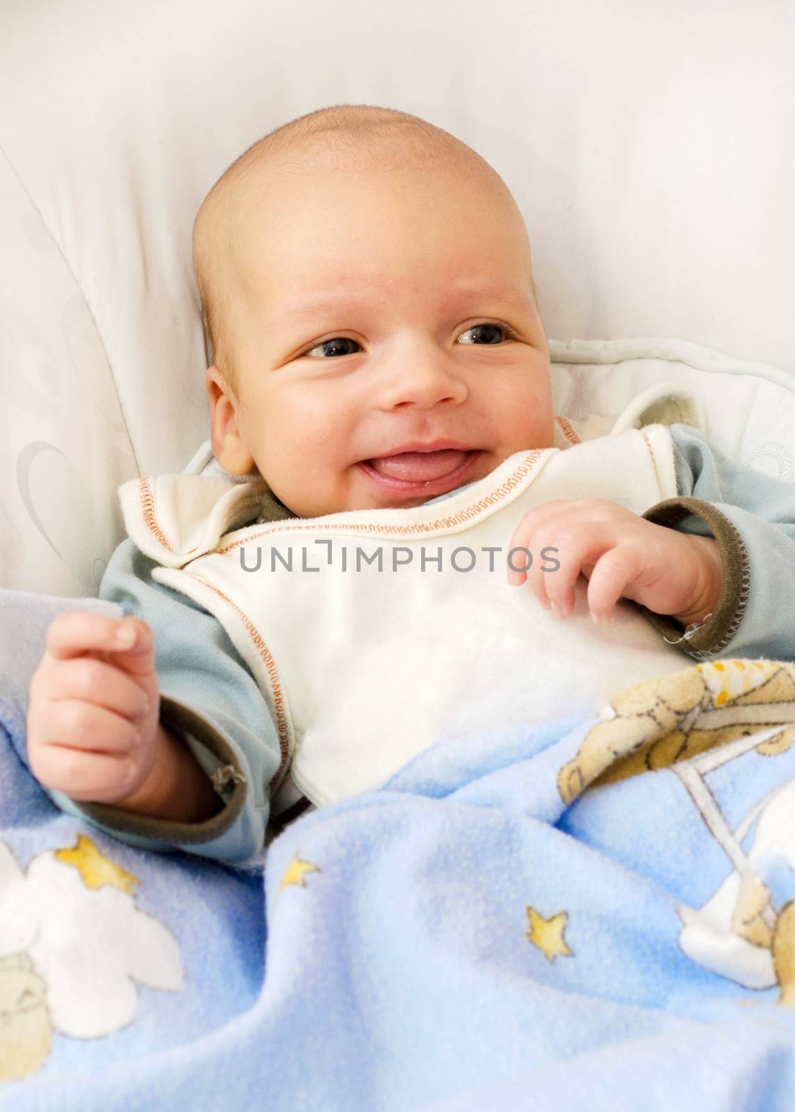 Newborn baby boy smiling by simpson33